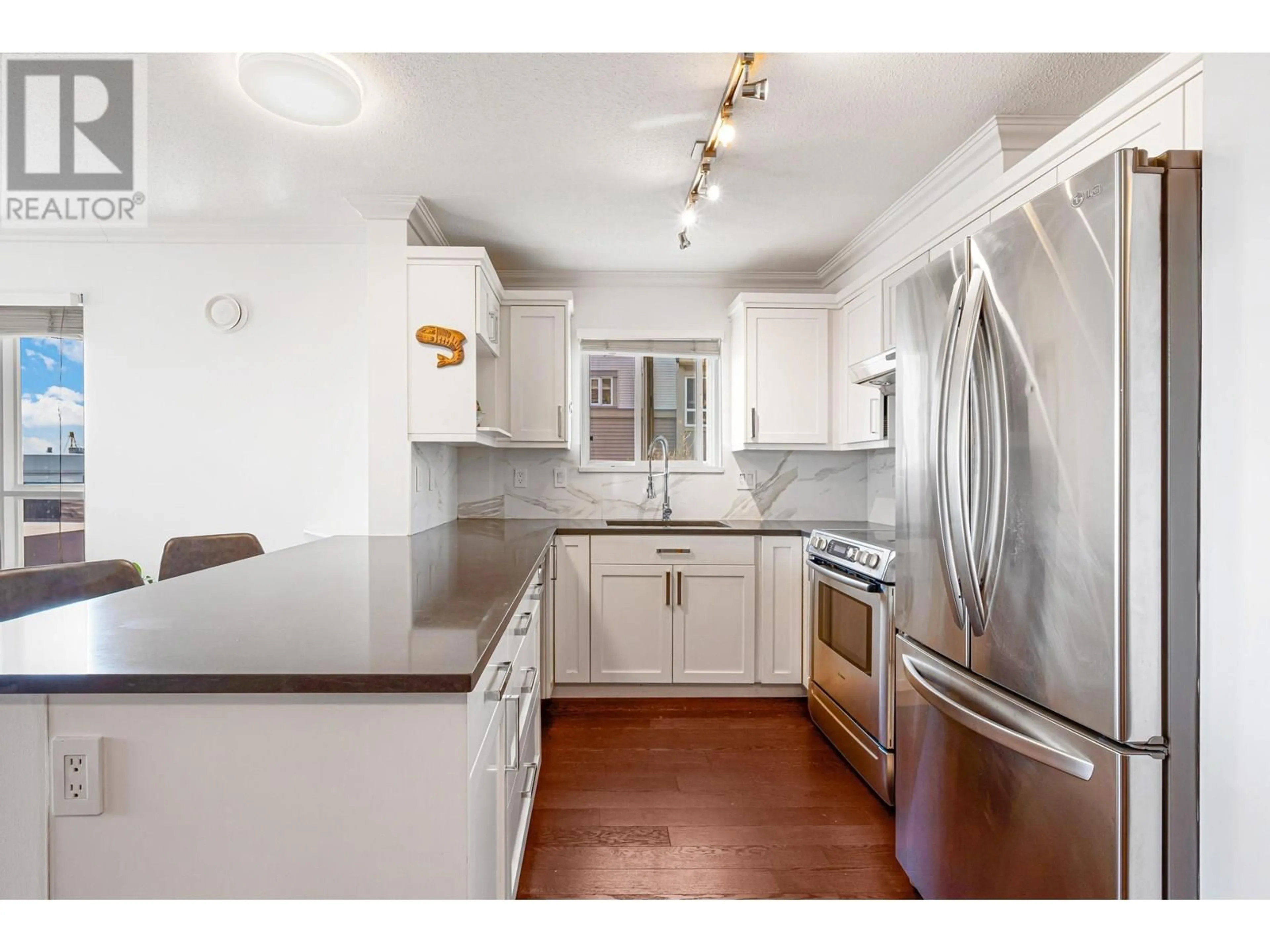 Open concept kitchen, unknown for 213 - 365 1ST STREET, North Vancouver British Columbia V7L4W5