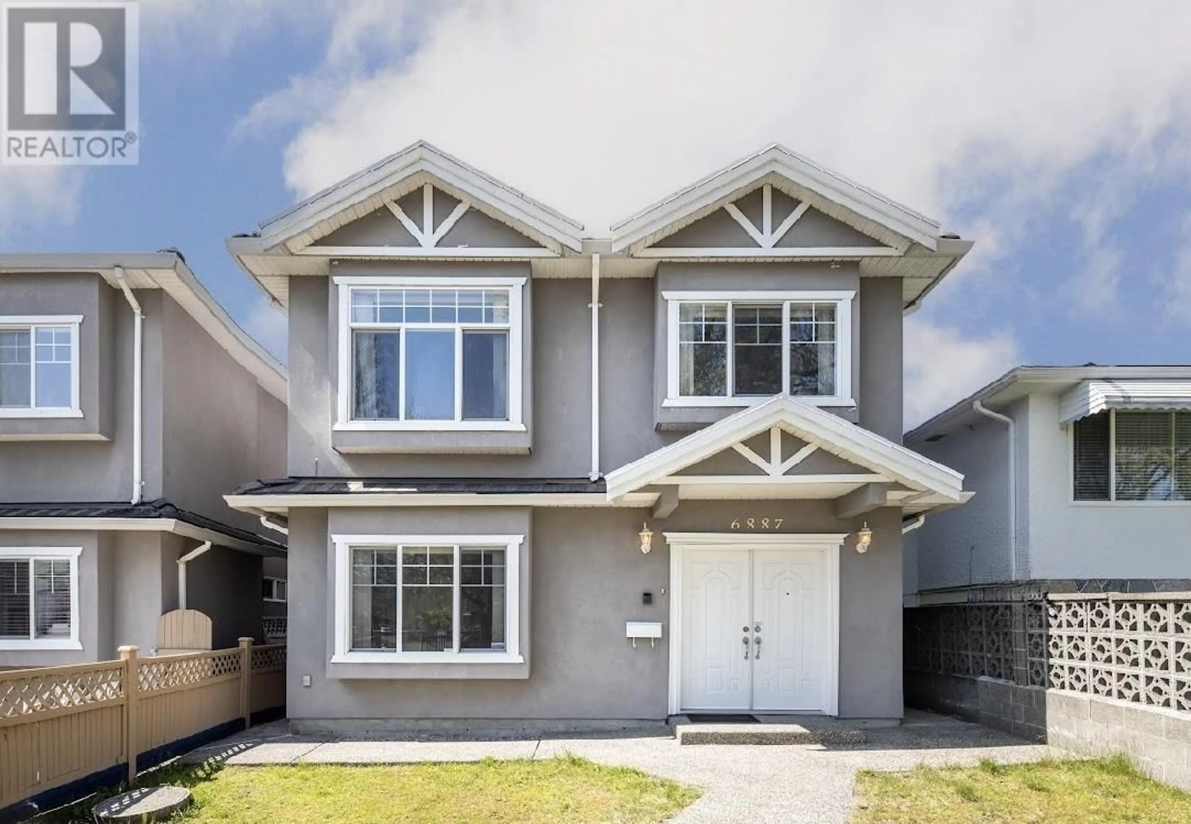 Home with vinyl exterior material, street for 6887 SHERBROOKE STREET, Vancouver British Columbia V5X4C9