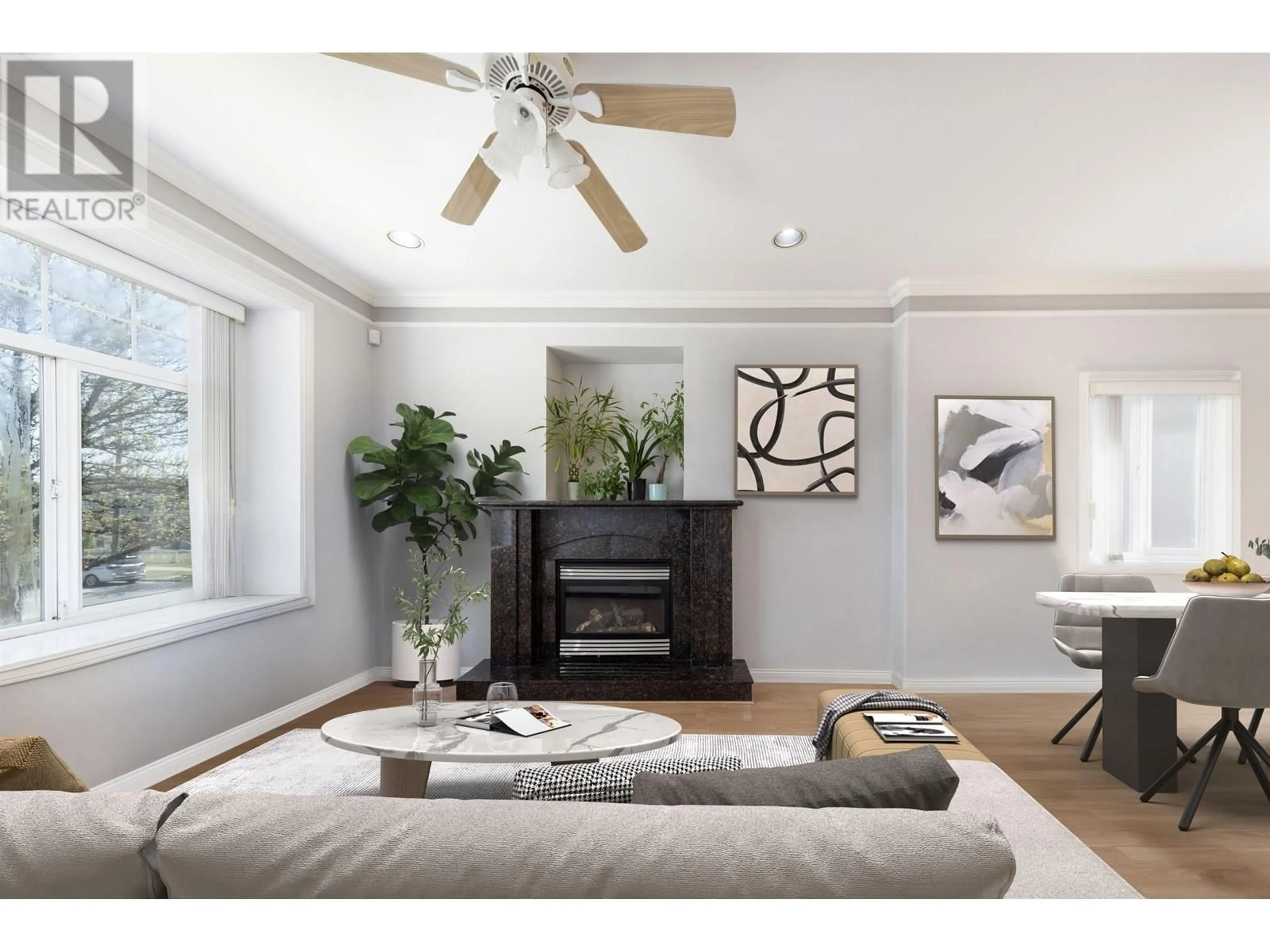 Living room with furniture, wood/laminate floor for 6887 SHERBROOKE STREET, Vancouver British Columbia V5X4C9