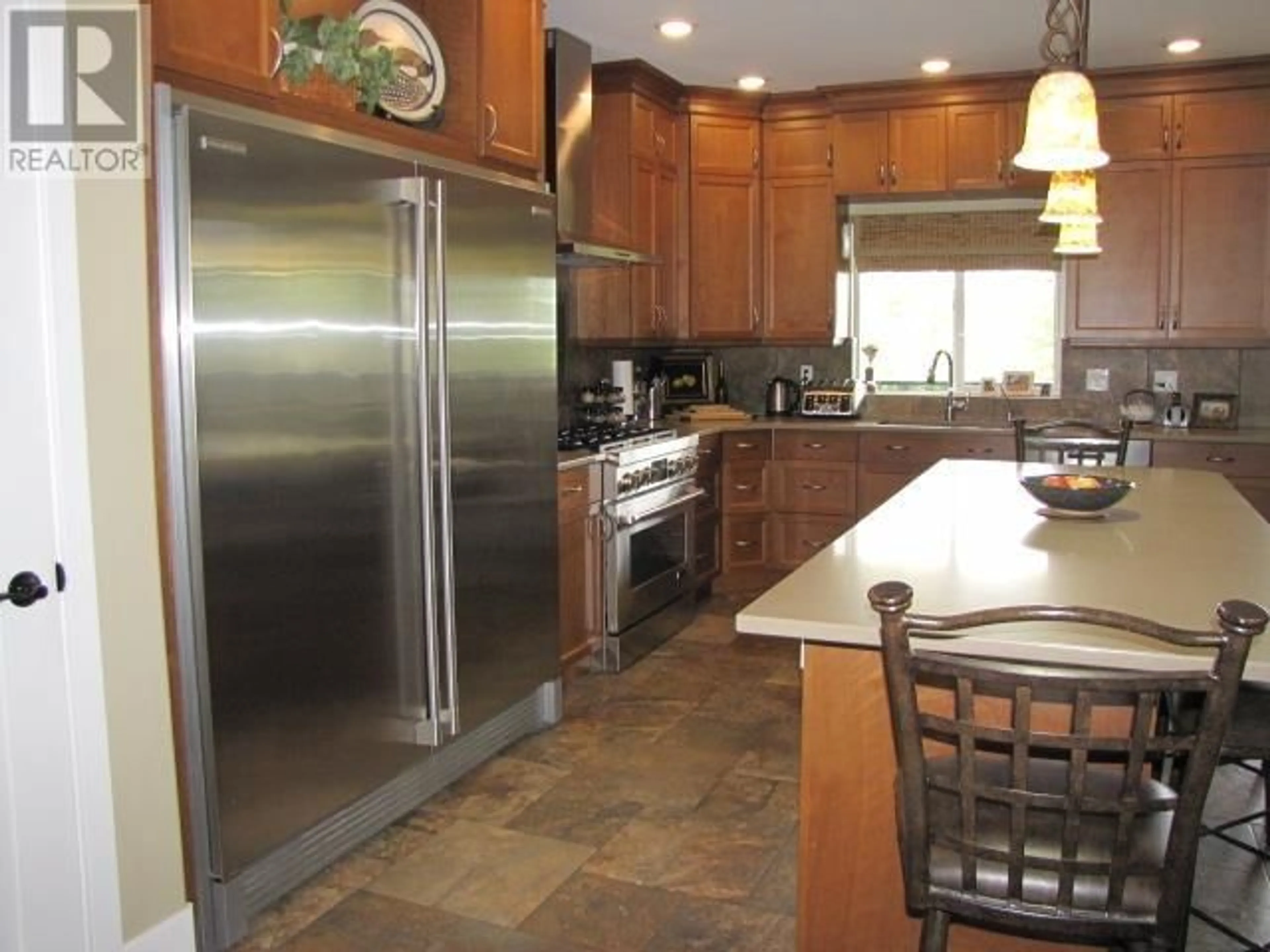 Open concept kitchen, ceramic/tile floor for 211 WOODLAND DRIVE, Williams Lake British Columbia V2G4P9