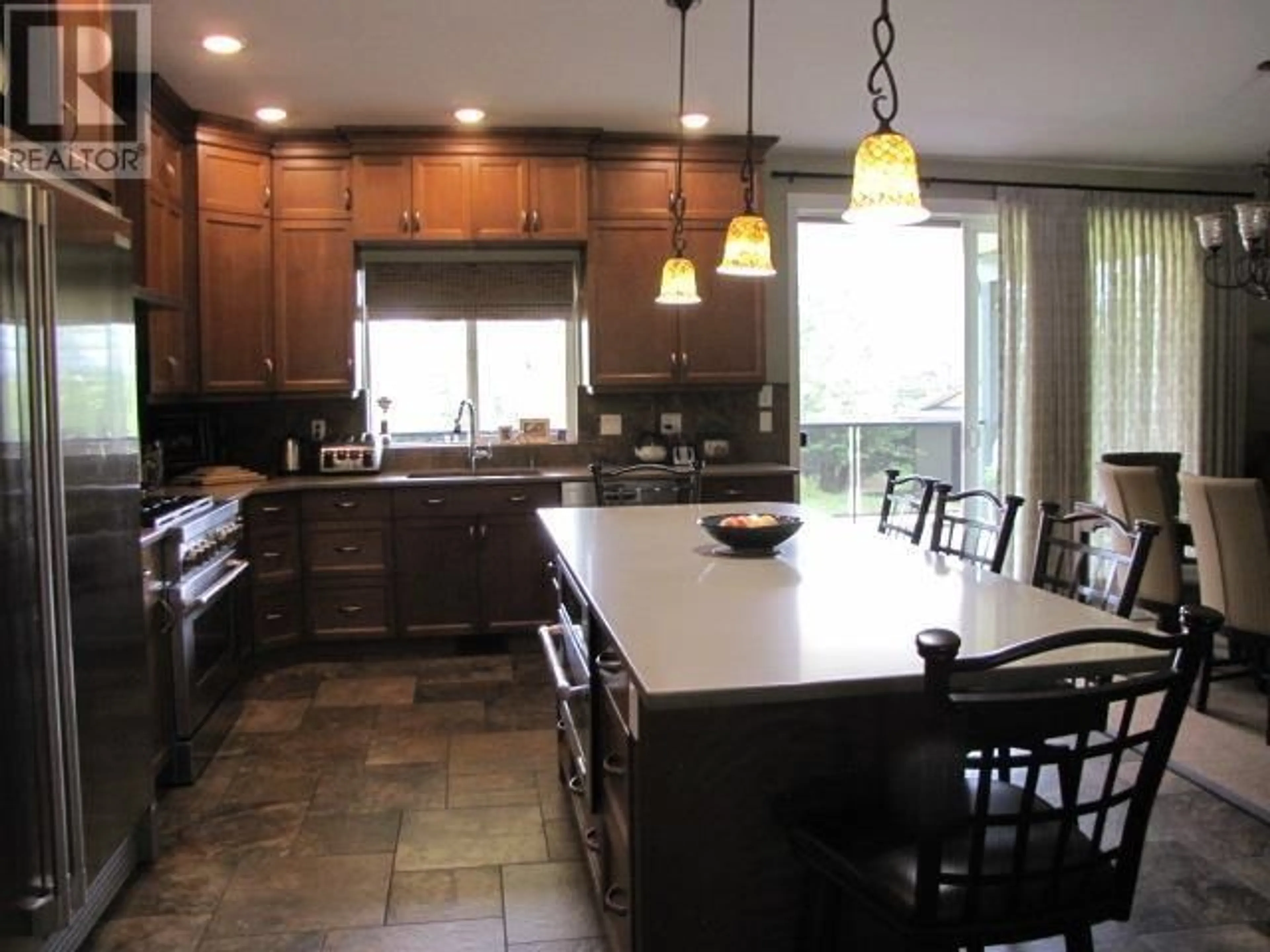 Open concept kitchen, ceramic/tile floor for 211 WOODLAND DRIVE, Williams Lake British Columbia V2G4P9