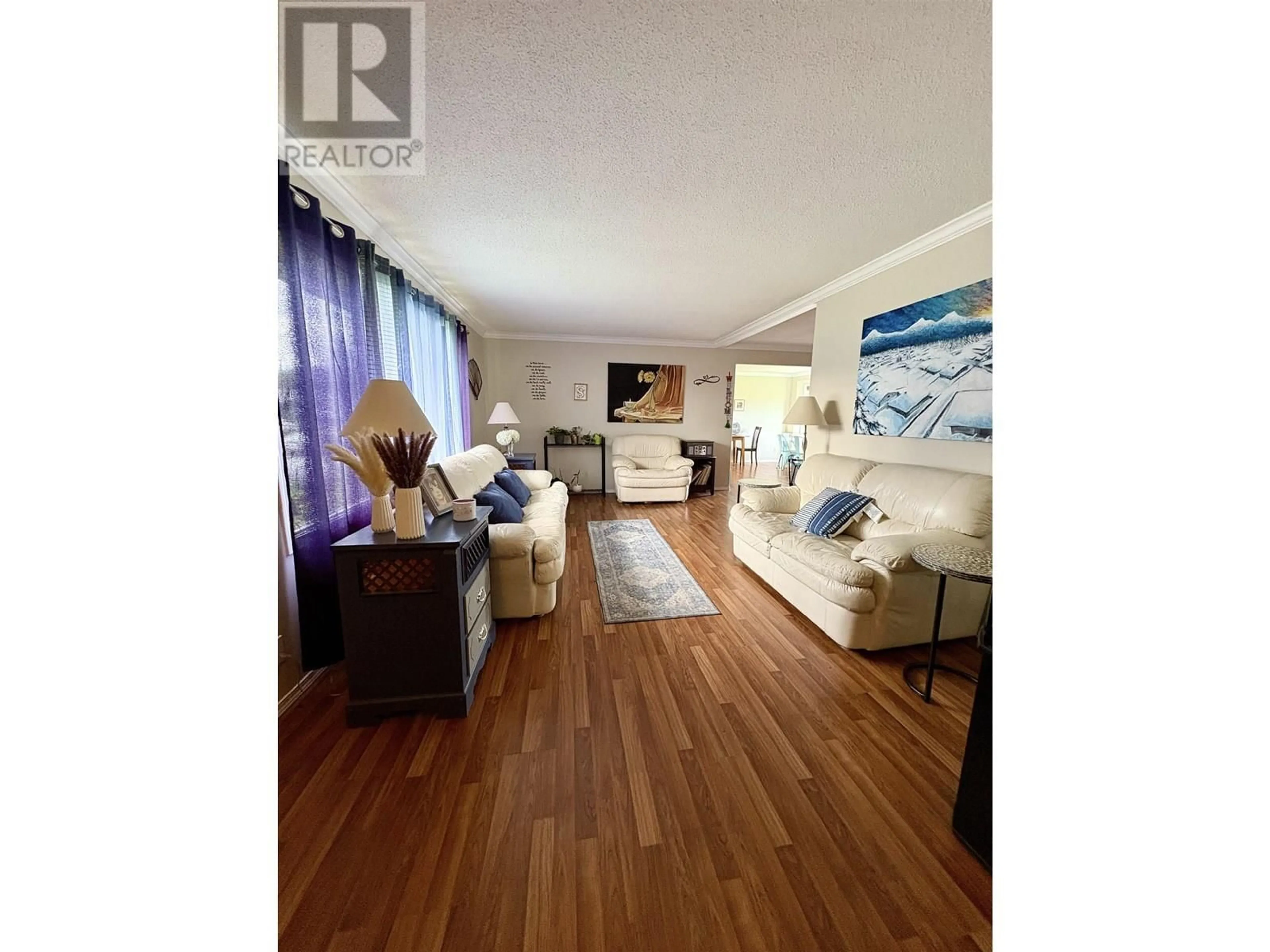 Living room with furniture, wood/laminate floor for 34 MOORE STREET, Kitimat British Columbia V8C1G7