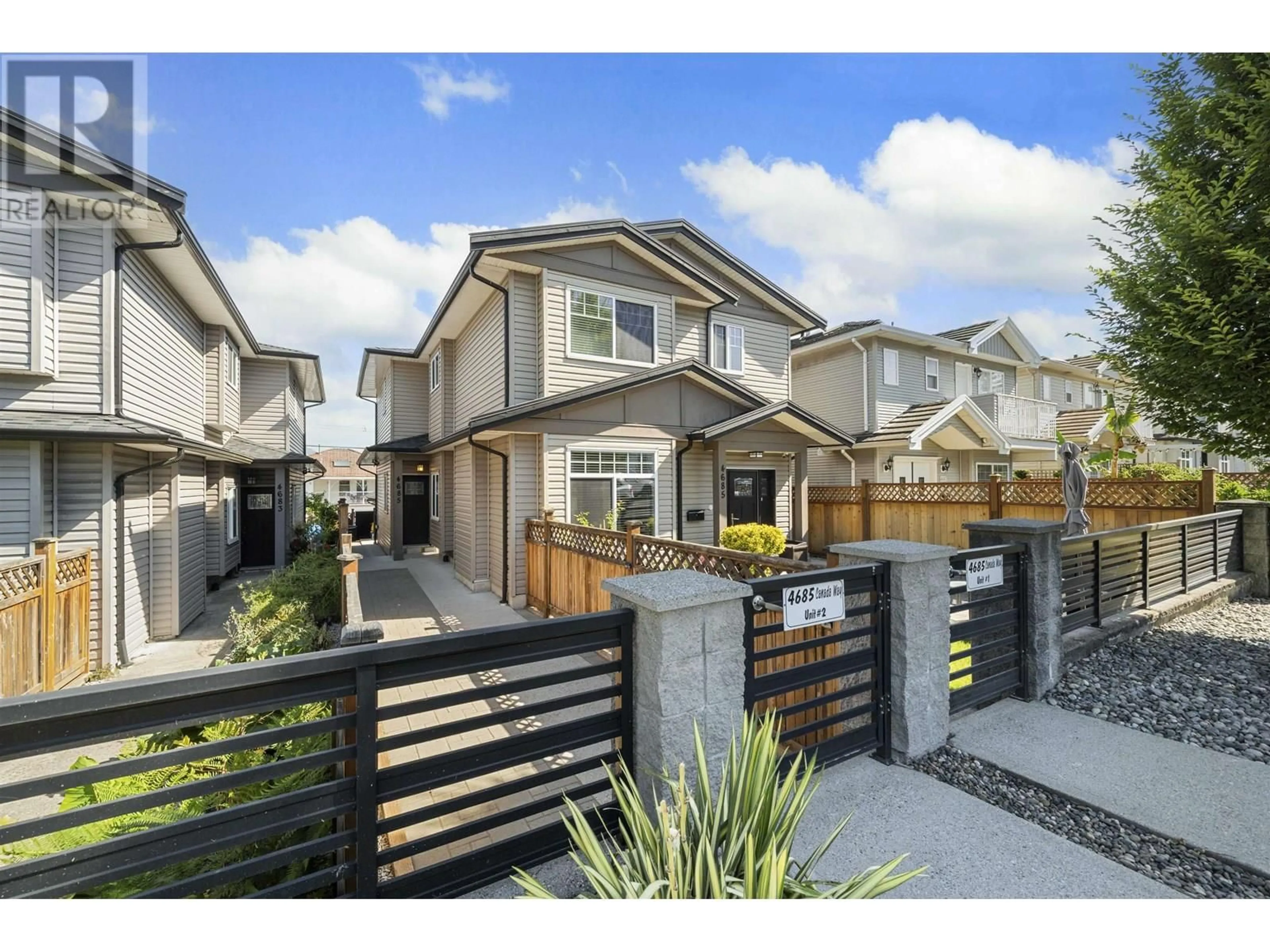 Home with vinyl exterior material, street for 2 - 4685 CANADA WAY, Burnaby British Columbia V5G1K9
