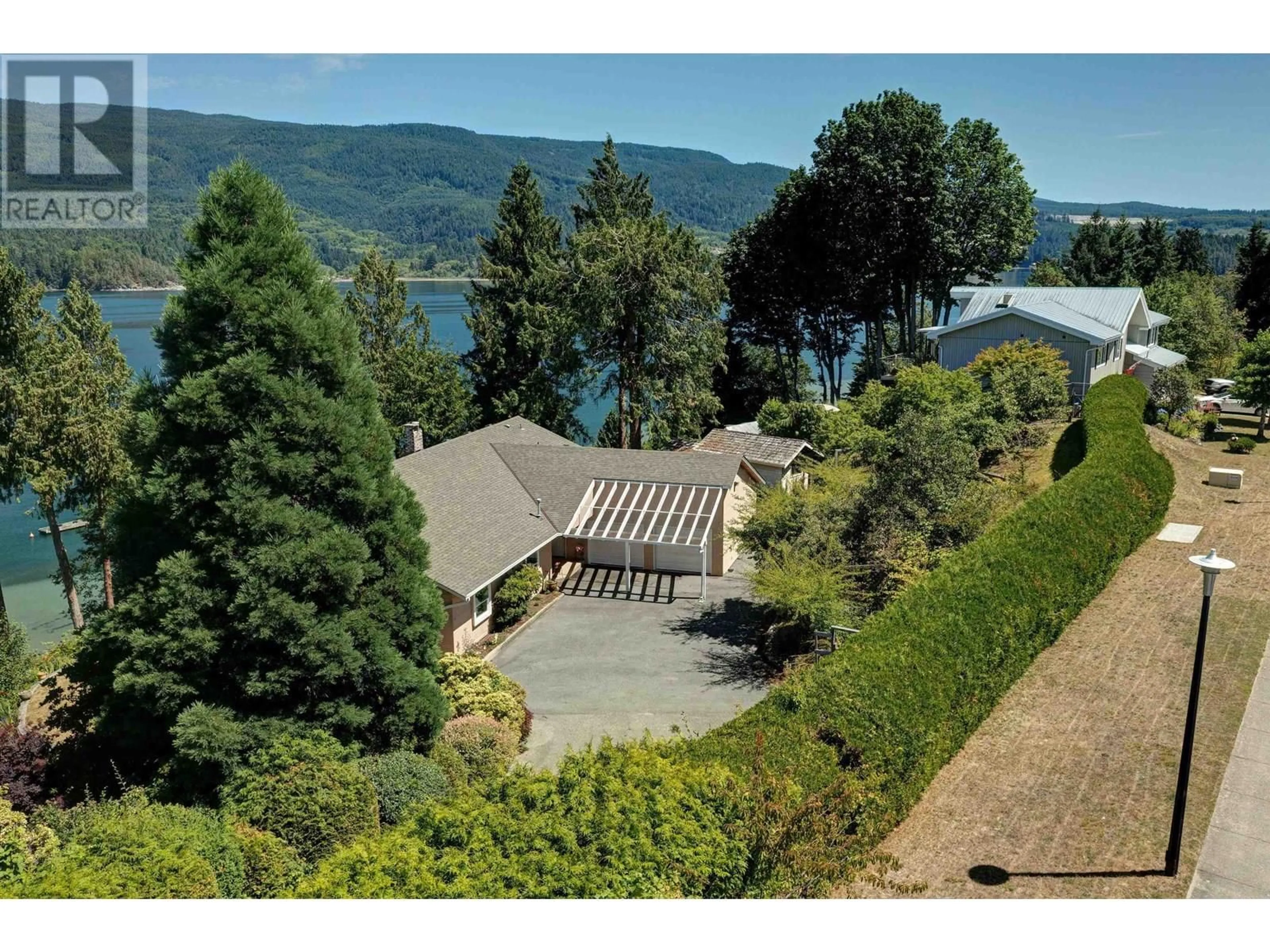 A pic from outside/outdoor area/front of a property/back of a property/a pic from drone, water/lake/river/ocean view for 6448 GALE AVENUE, Sechelt British Columbia V7Z0L1
