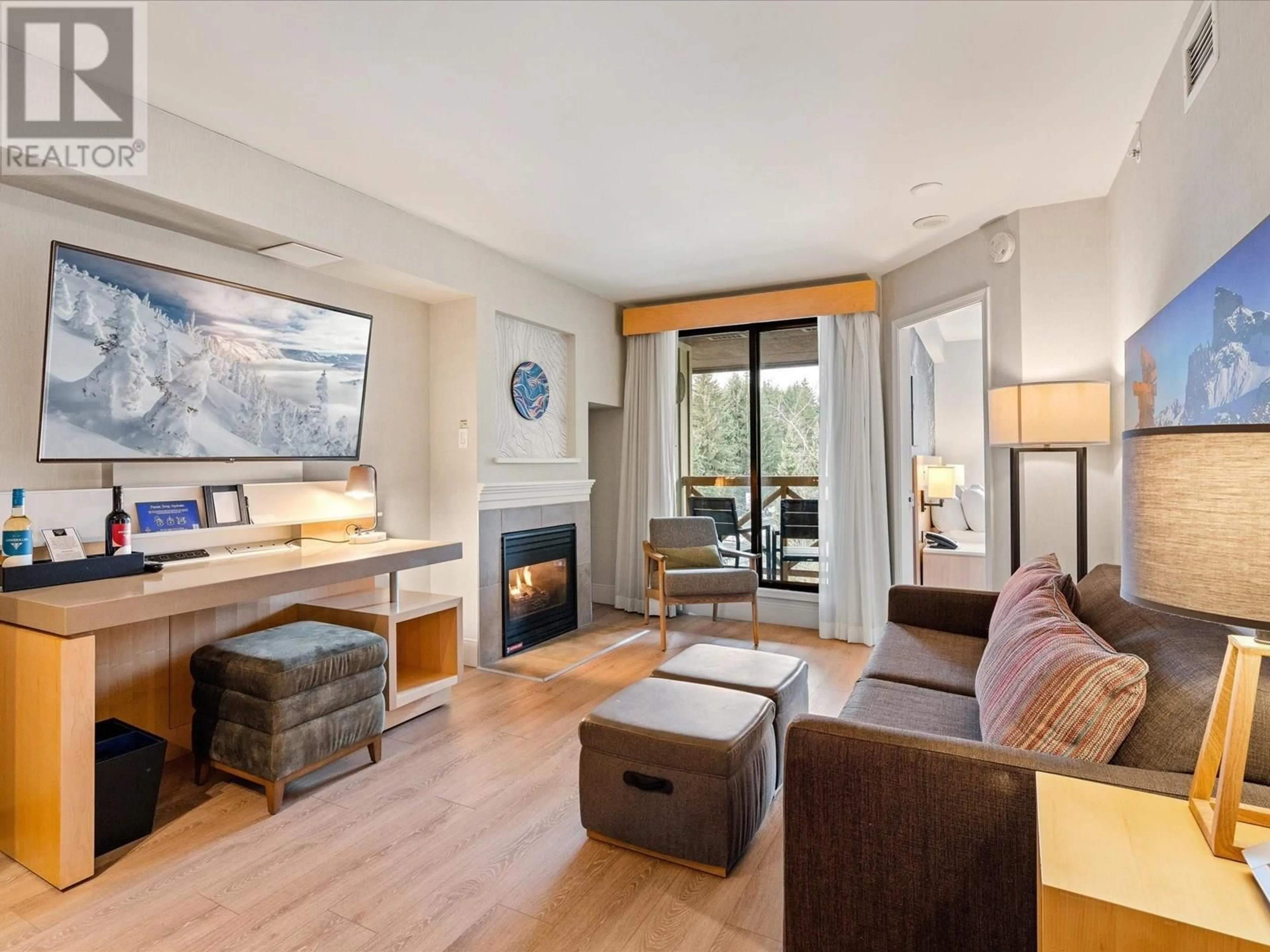 Living room with furniture, wood/laminate floor for 2428 - 4308 MAIN STREET, Whistler British Columbia V8E1A9