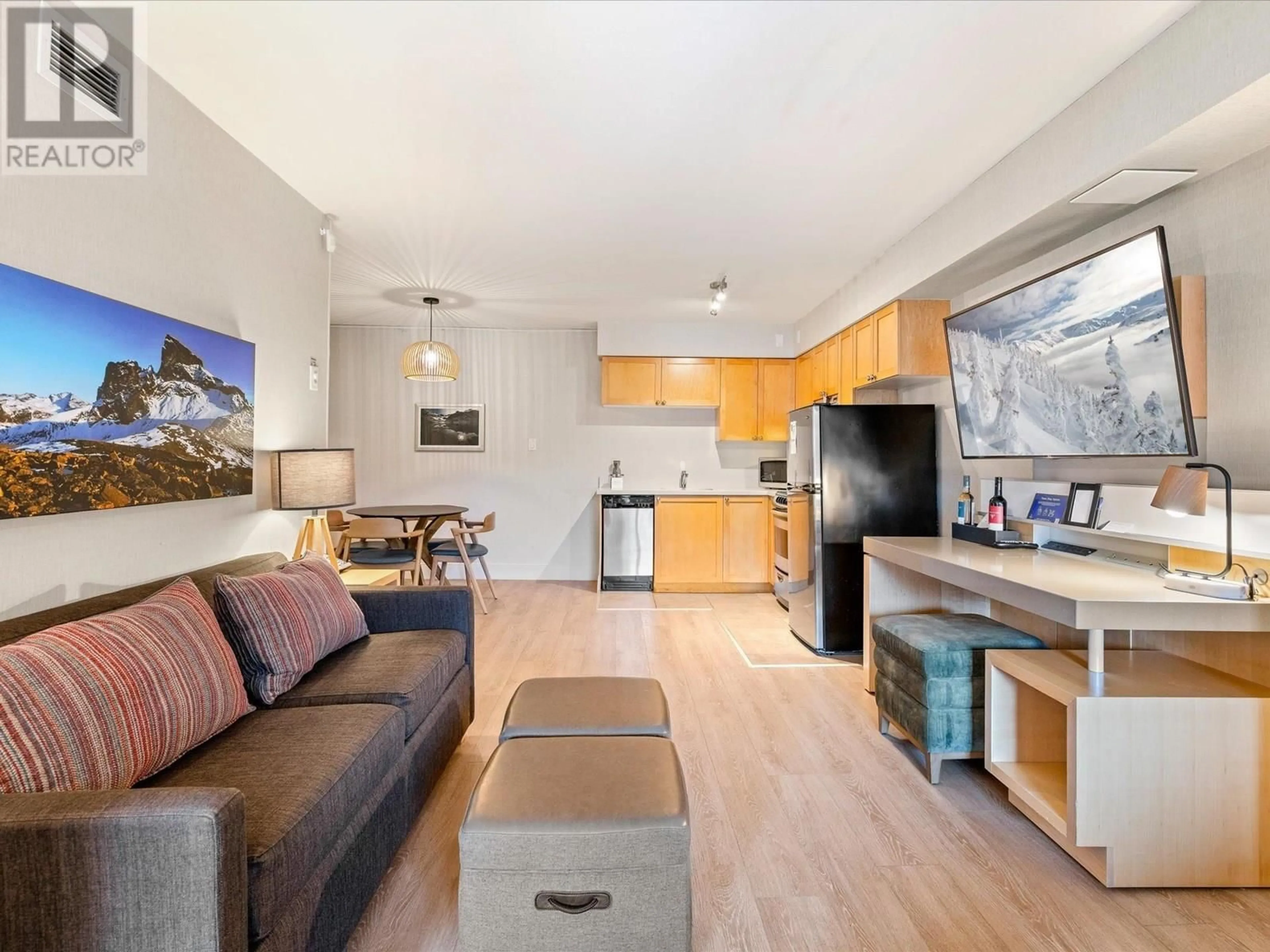 Living room with furniture, wood/laminate floor for 2428 - 4308 MAIN STREET, Whistler British Columbia V8E1A9