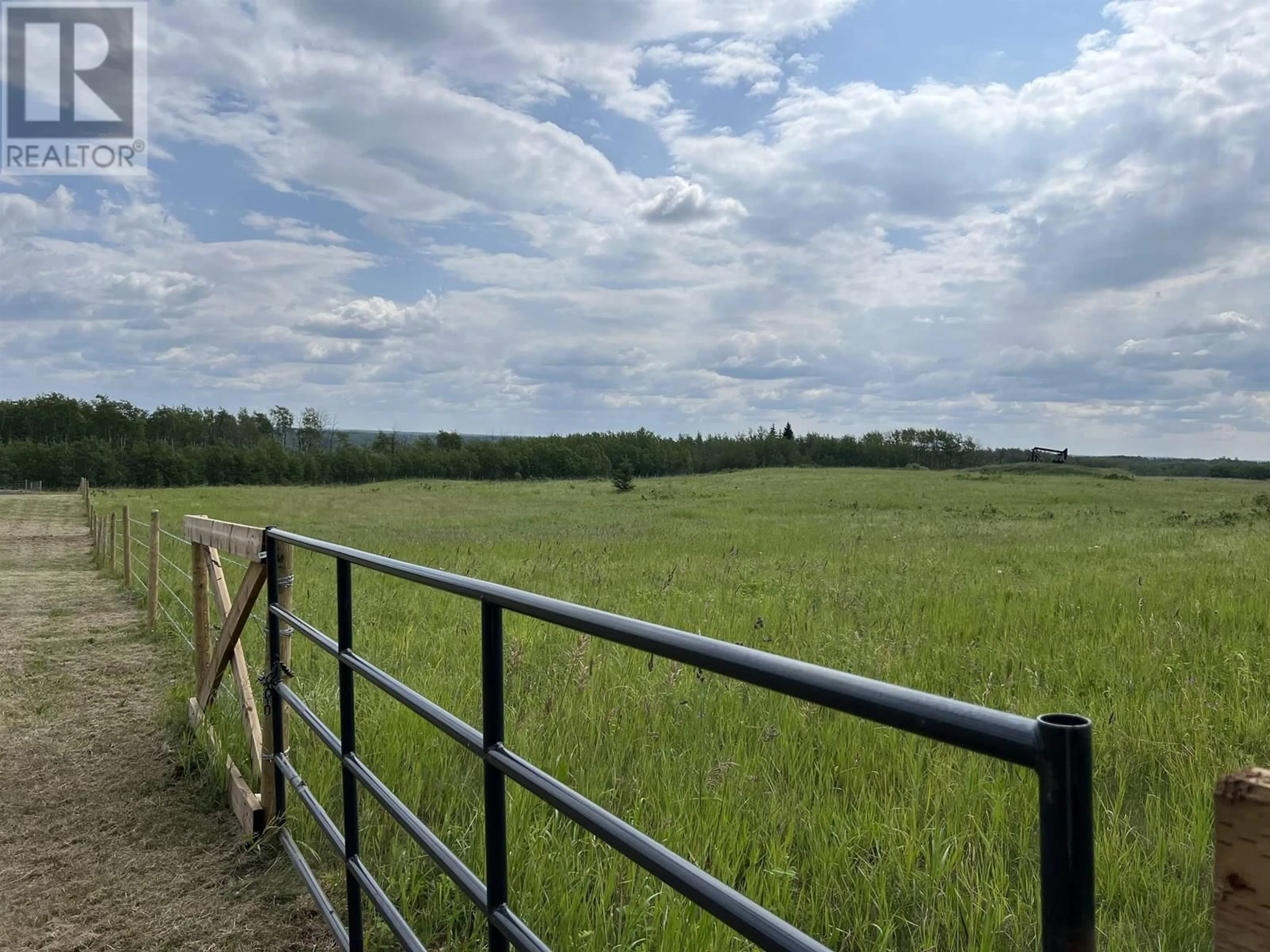 A pic from outside/outdoor area/front of a property/back of a property/a pic from drone, forest/trees view for 16573 255 ROAD, Fort St. John British Columbia V0C2H0