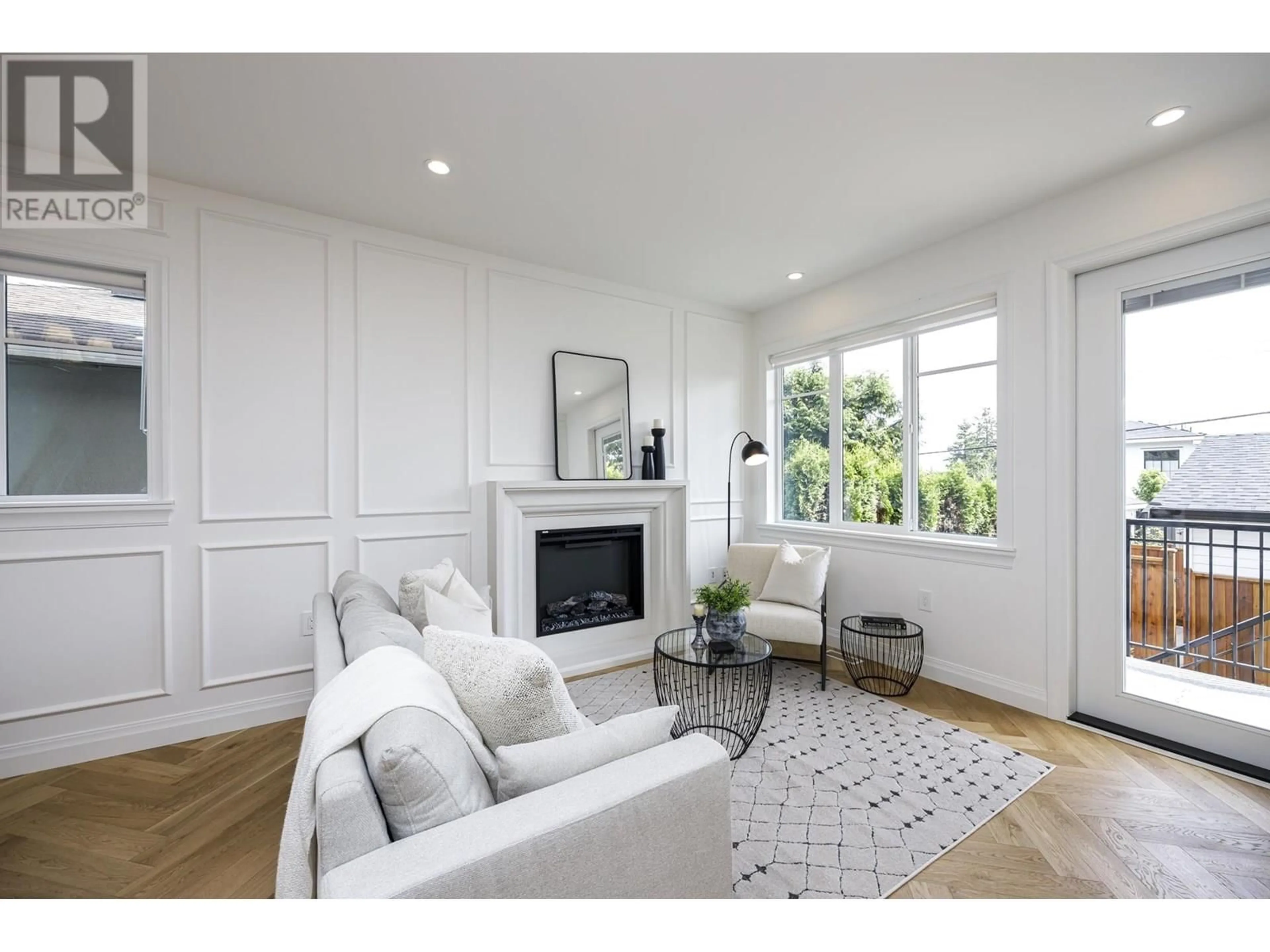 Living room with furniture, wood/laminate floor for 261 23RD STREET, North Vancouver British Columbia V7L3E4