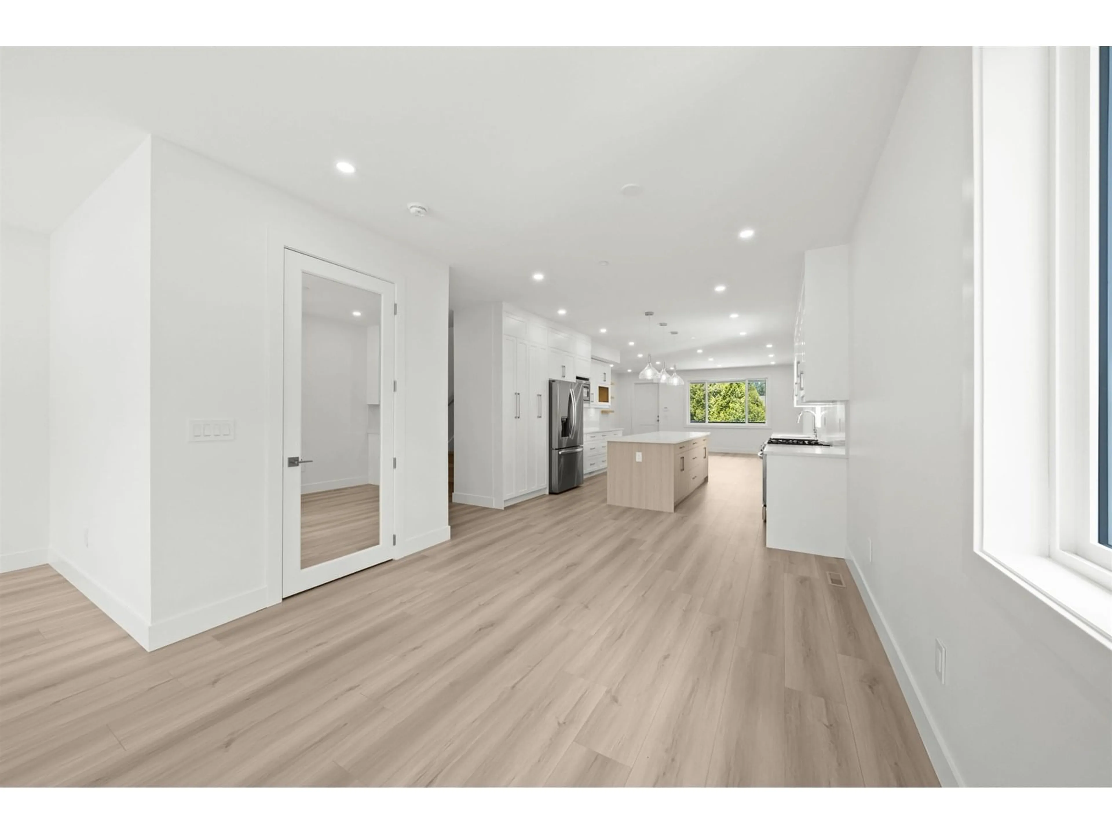 Open concept kitchen, wood/laminate floor for 2 - 26725 FRASER, Langley British Columbia V4W3L1