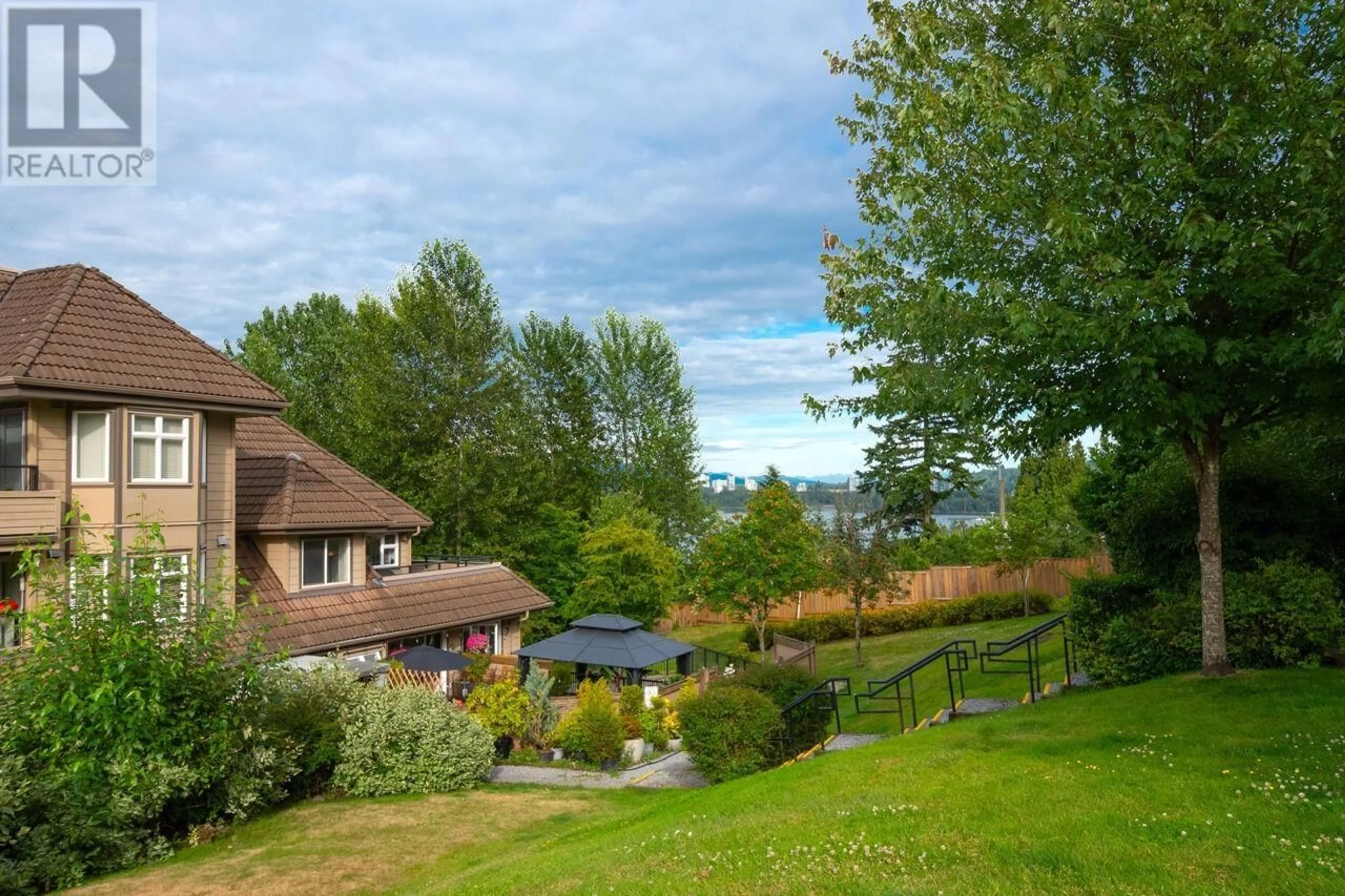 A pic from outside/outdoor area/front of a property/back of a property/a pic from drone, unknown for 407 - 160 SHORELINE CIRCLE, Port Moody British Columbia V3H0B2