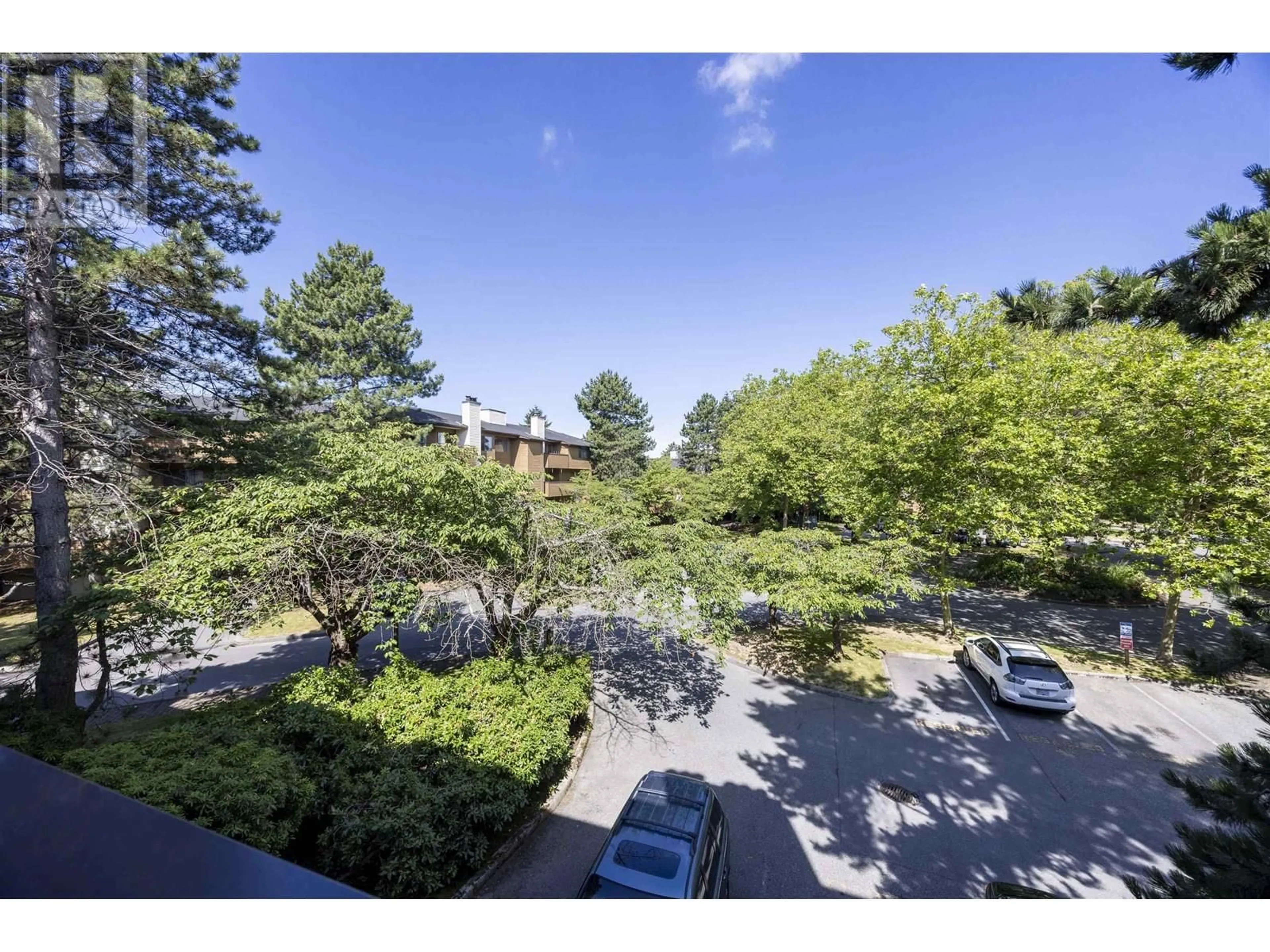 A pic from outside/outdoor area/front of a property/back of a property/a pic from drone, forest/trees view for 204 - 7297 MOFFATT ROAD, Richmond British Columbia V6Y1X9
