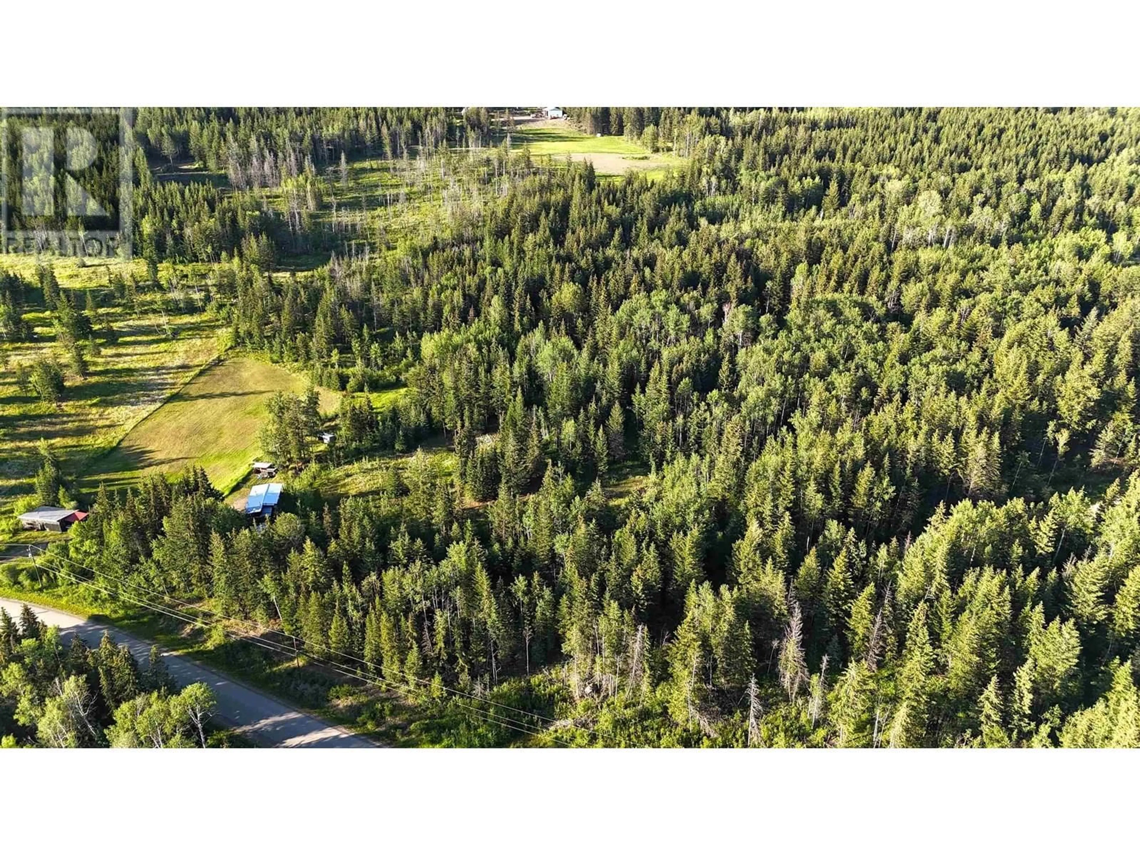 A pic from outside/outdoor area/front of a property/back of a property/a pic from drone, forest/trees view for 3729 SPOKIN LAKE ROAD, 150 Mile House British Columbia V0K2G0