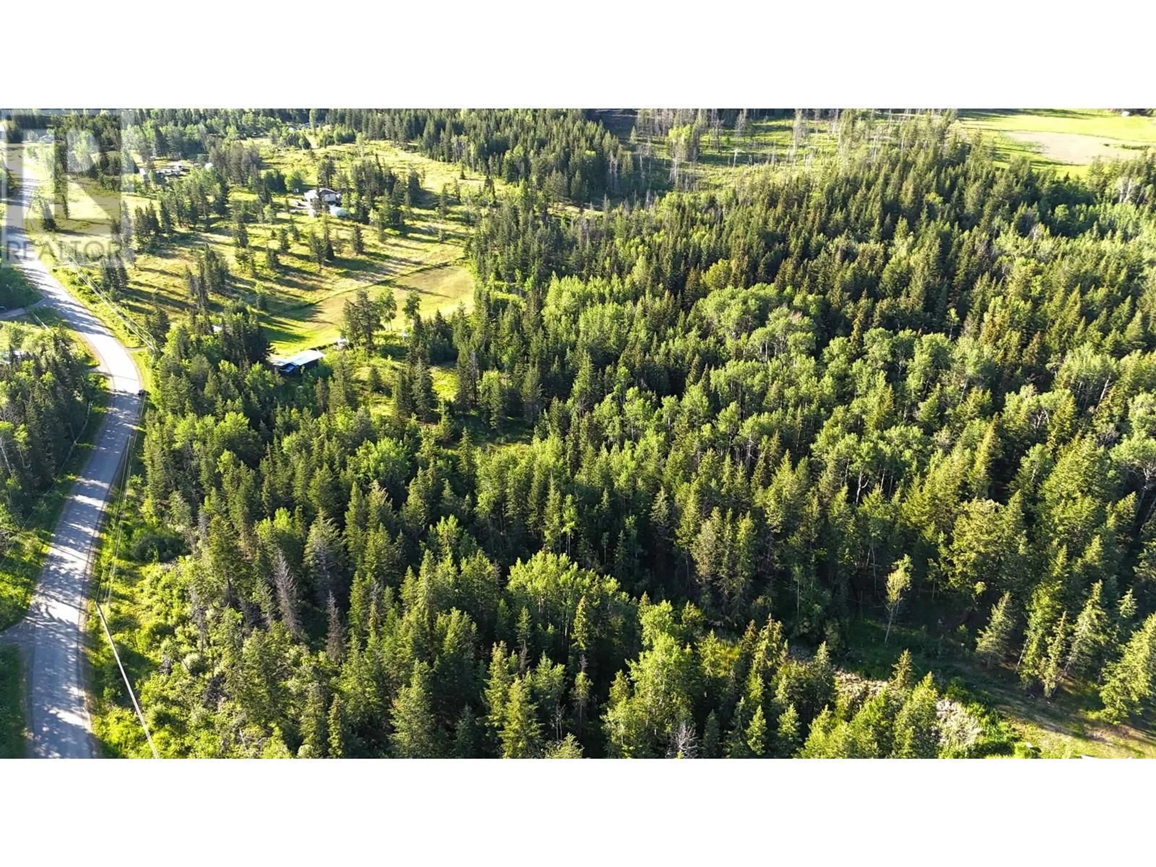 A pic from outside/outdoor area/front of a property/back of a property/a pic from drone, forest/trees view for 3729 SPOKIN LAKE ROAD, 150 Mile House British Columbia V0K2G0