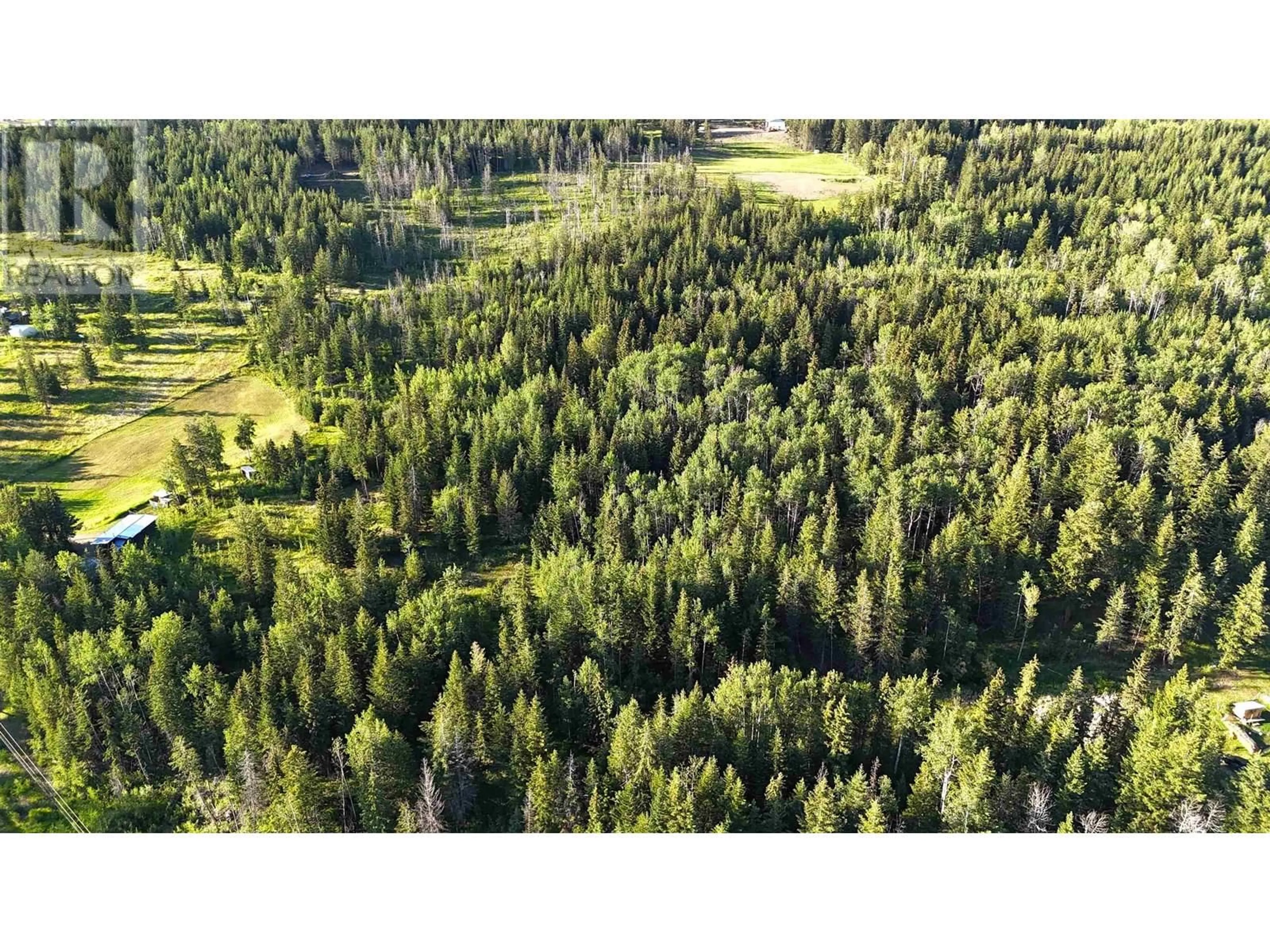 A pic from outside/outdoor area/front of a property/back of a property/a pic from drone, forest/trees view for 3729 SPOKIN LAKE ROAD, 150 Mile House British Columbia V0K2G0