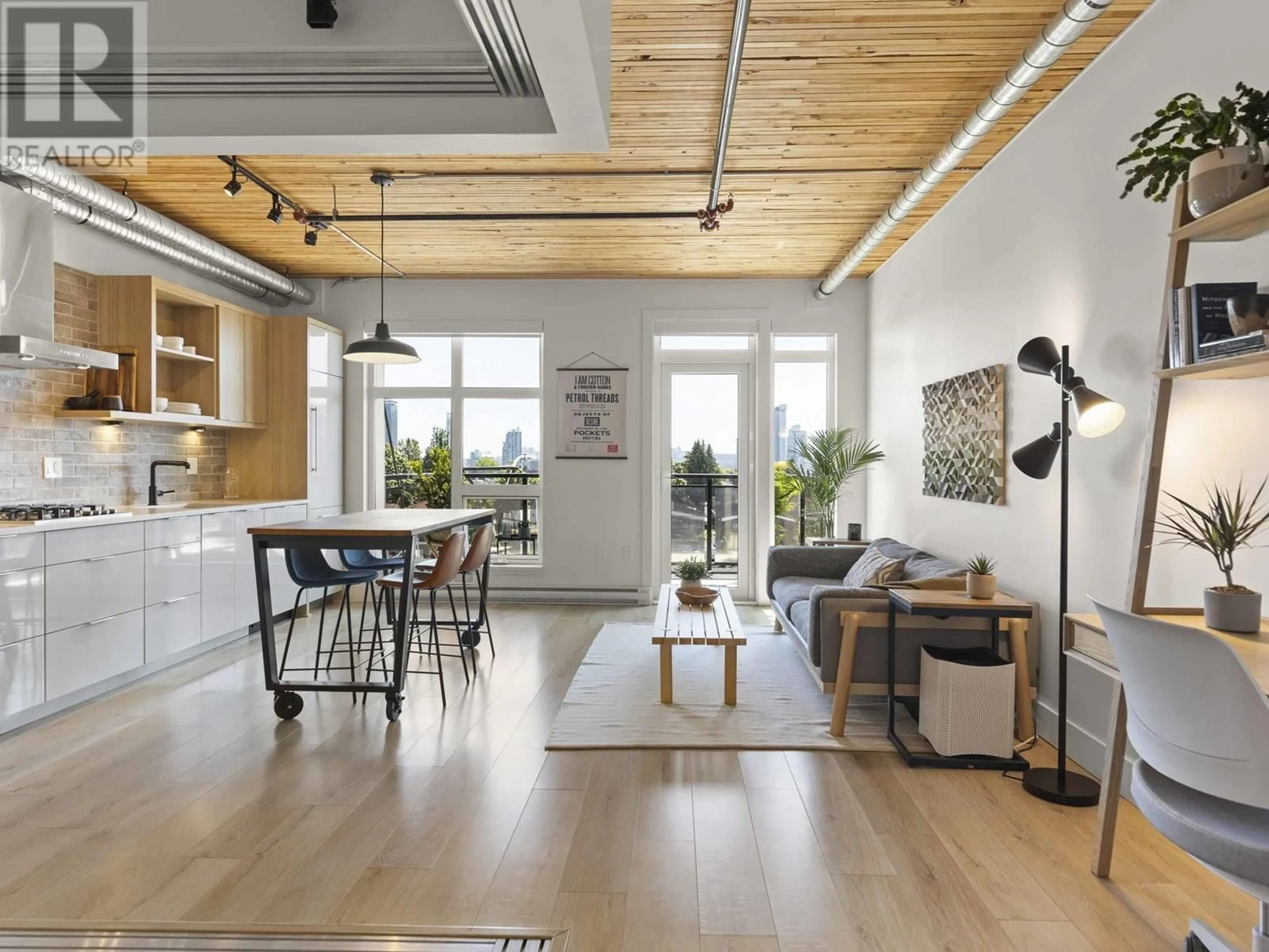 Open concept kitchen, unknown for 308 - 4223 HASTINGS STREET, Burnaby British Columbia V5C2J5