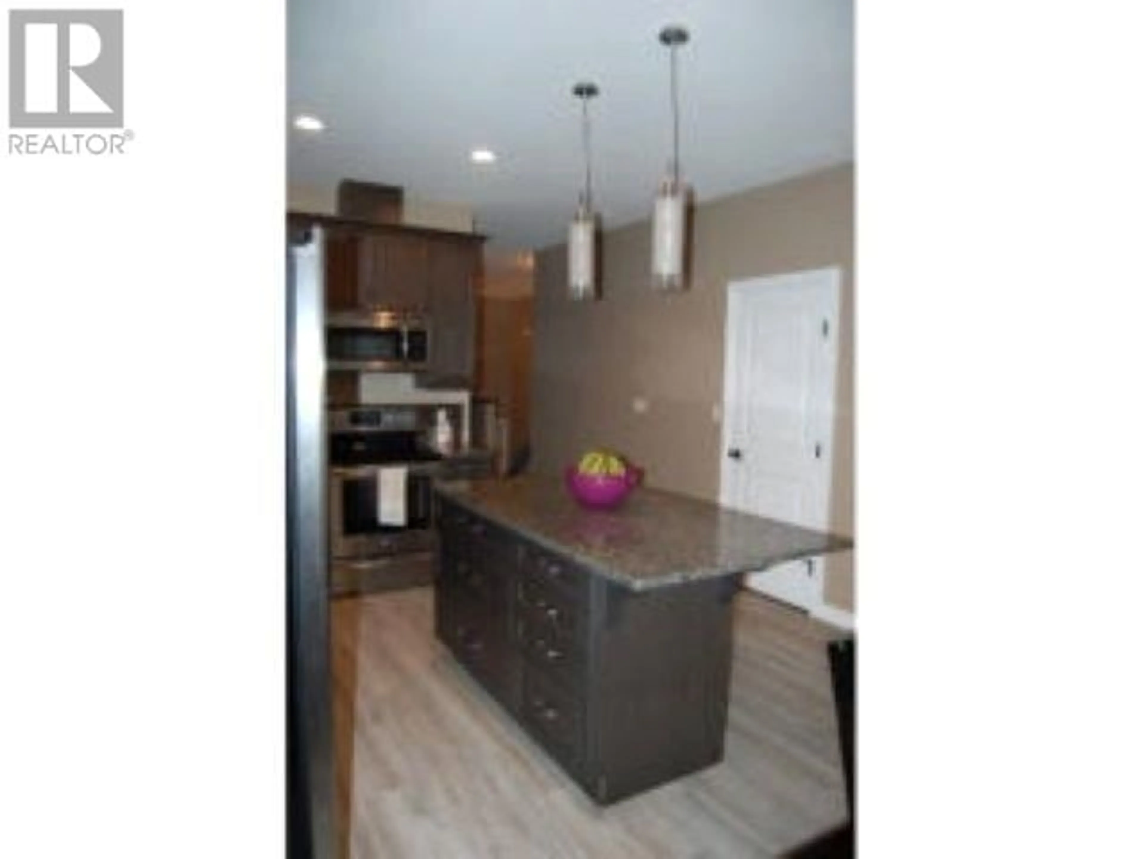 Open concept kitchen, unknown for 8703 82 STREET, Fort St. John British Columbia V1J0N8