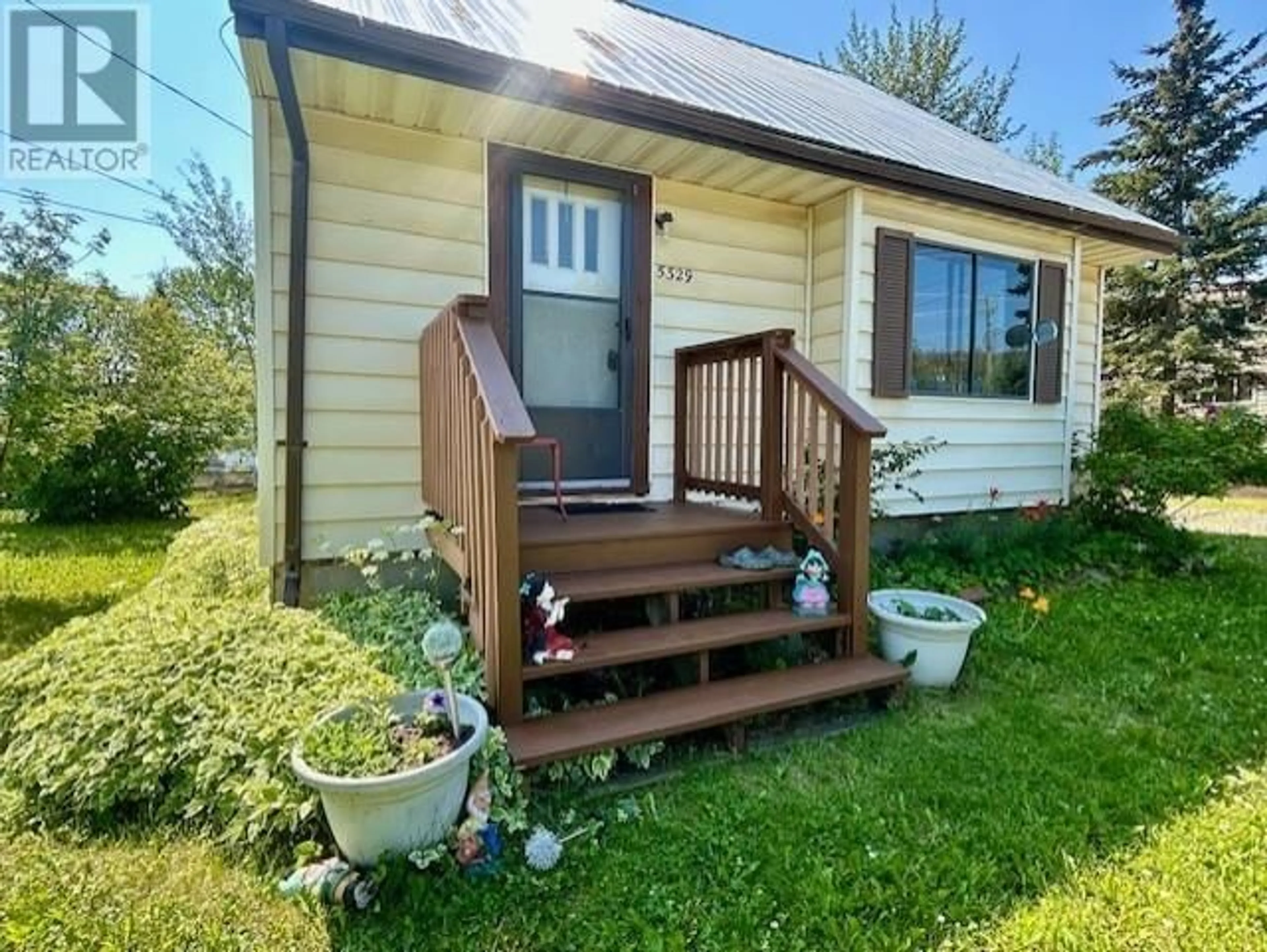 A pic from outside/outdoor area/front of a property/back of a property/a pic from drone, unknown for 5329 55 AVENUE, Fort Nelson British Columbia V0C1R0