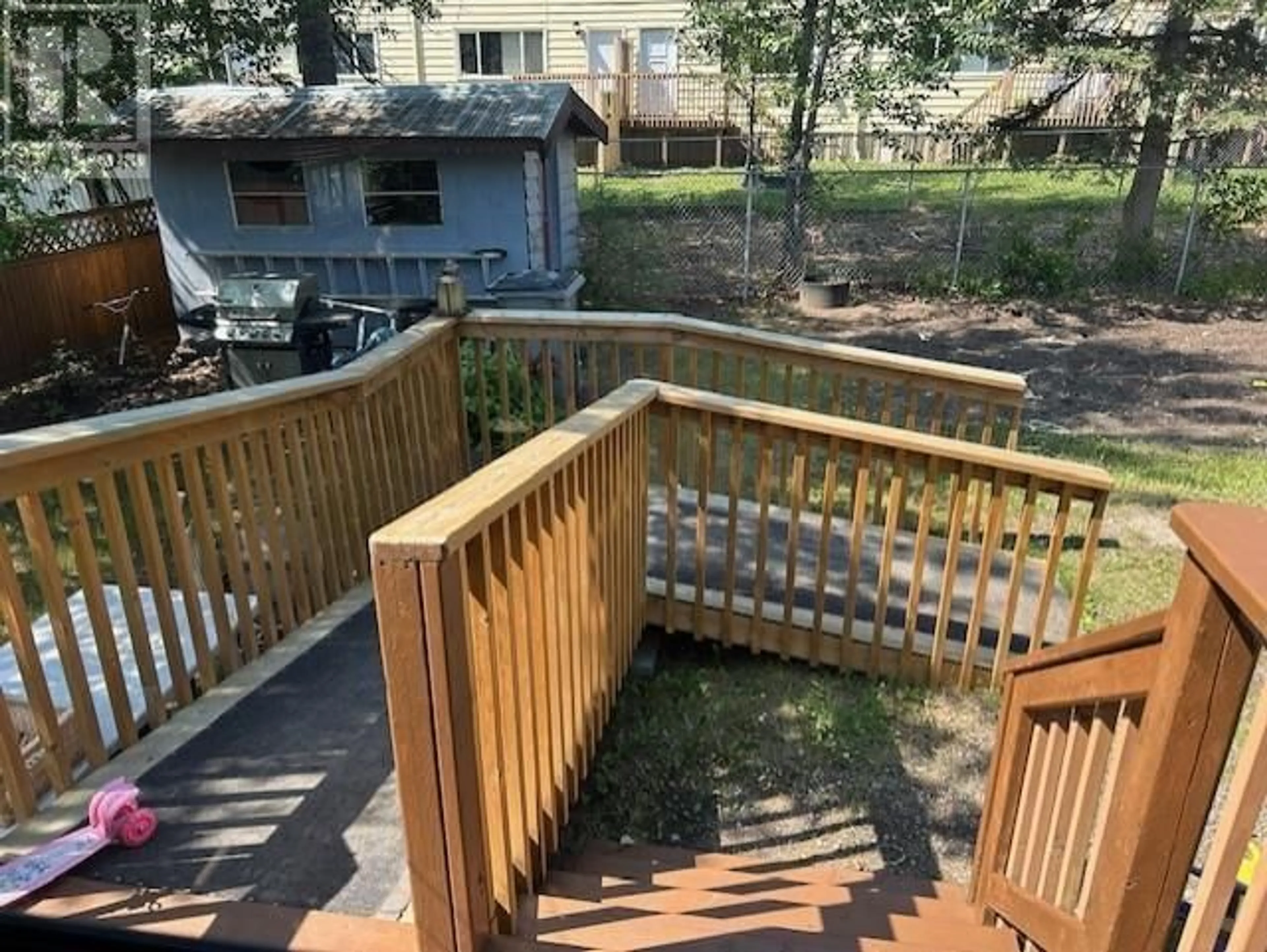 Patio, forest/trees view for 5329 55 AVENUE, Fort Nelson British Columbia V0C1R0