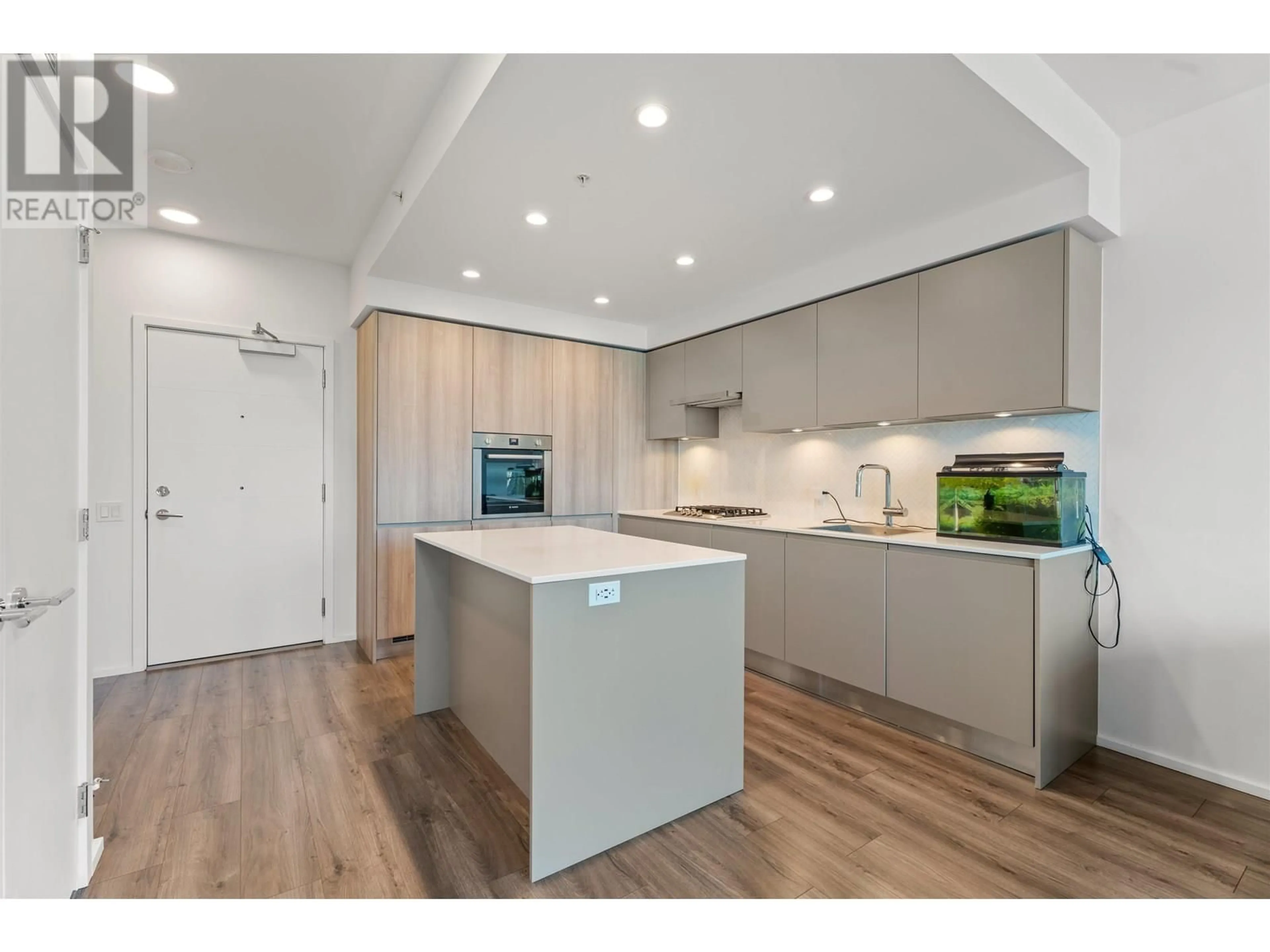 Open concept kitchen, wood/laminate floor for 807 - 3809 EVERGREEN PLACE, Burnaby British Columbia V3J0M1