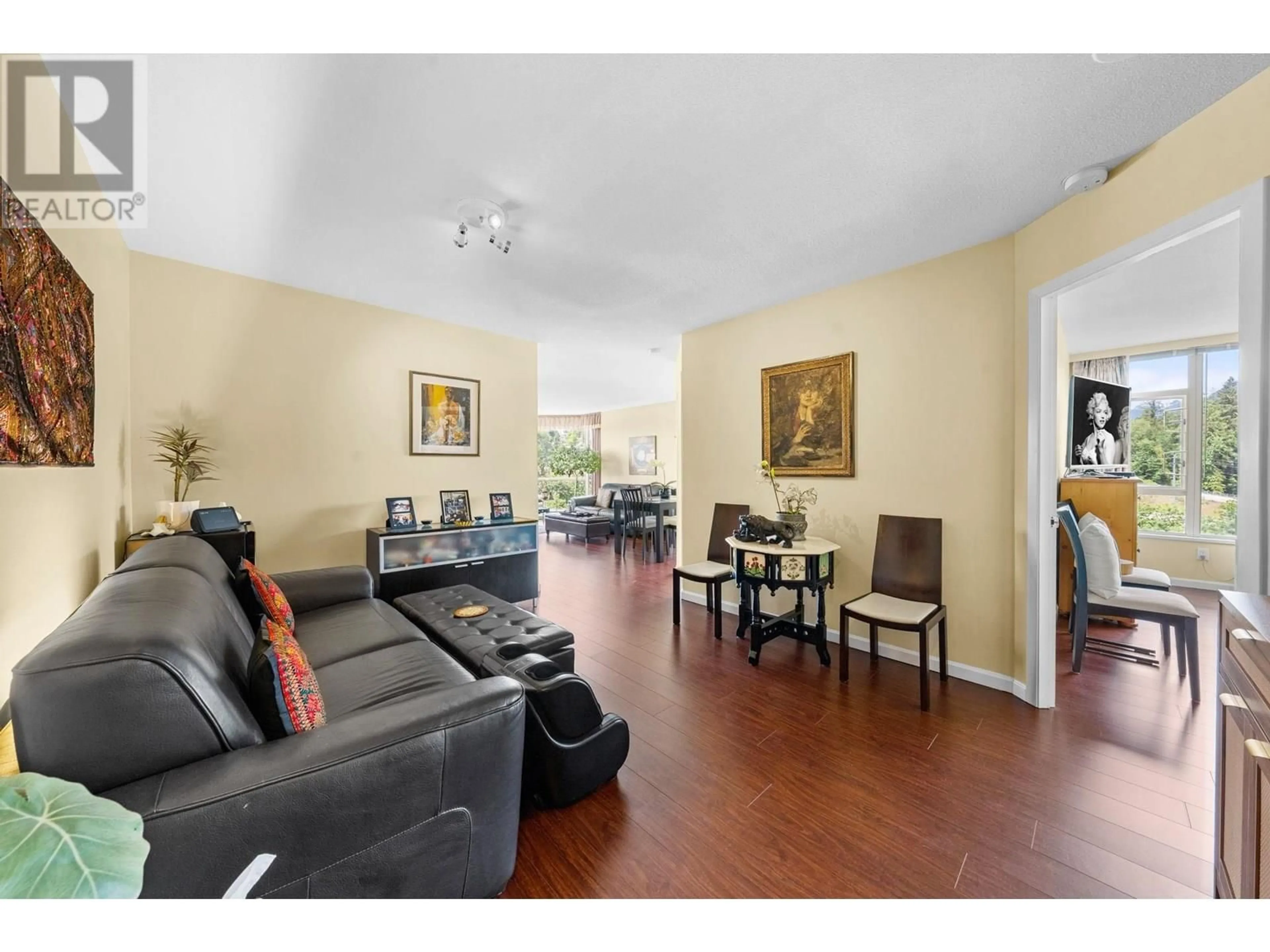 Living room with furniture, wood/laminate floor for 1106 - 1327 KEITH ROAD, North Vancouver British Columbia V7J3T5
