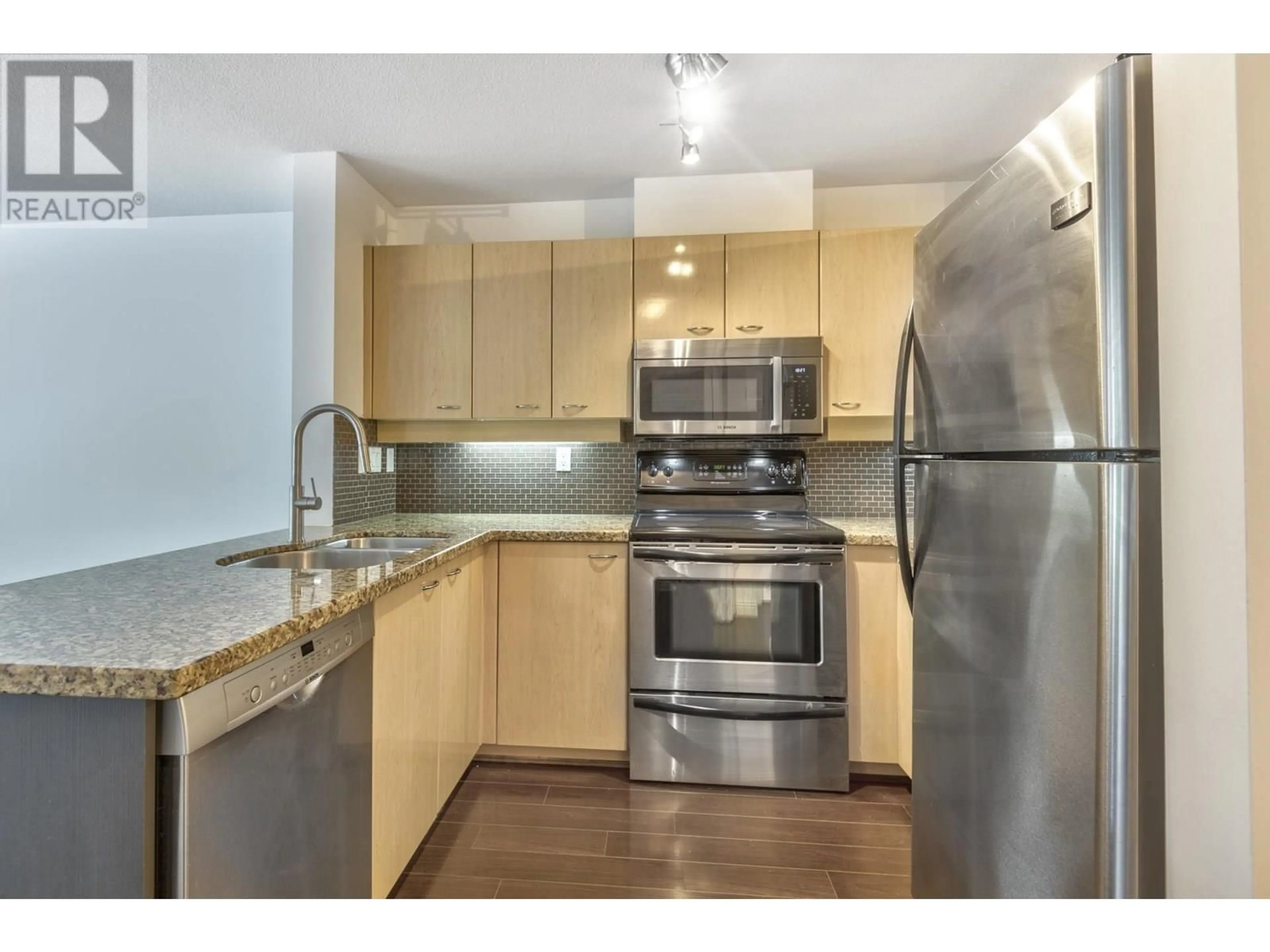 Standard kitchen, wood/laminate floor for 307 - 2288 MARSTRAND AVENUE, Vancouver British Columbia V6K4S9