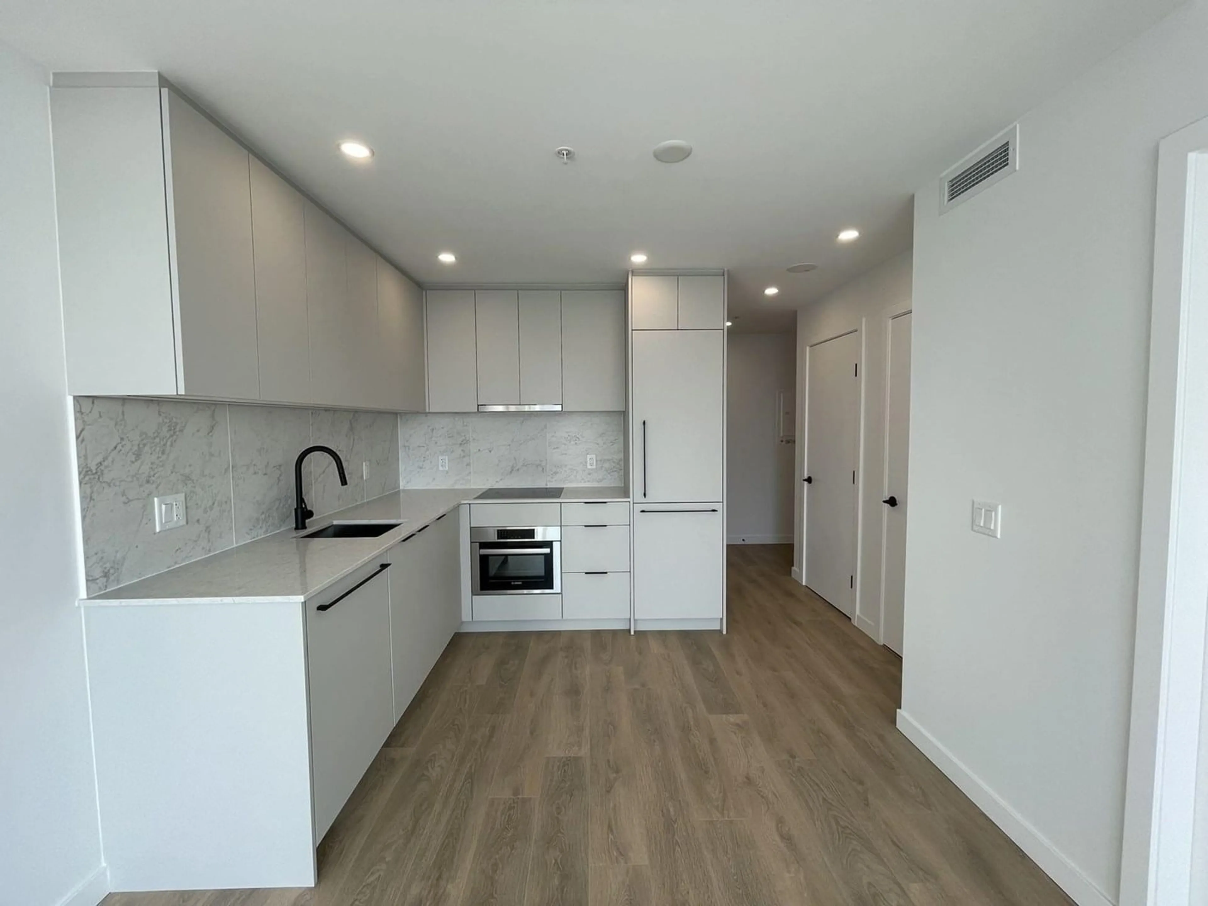 Open concept kitchen, unknown for 1806 - 13685 102, Surrey British Columbia V3T1N7