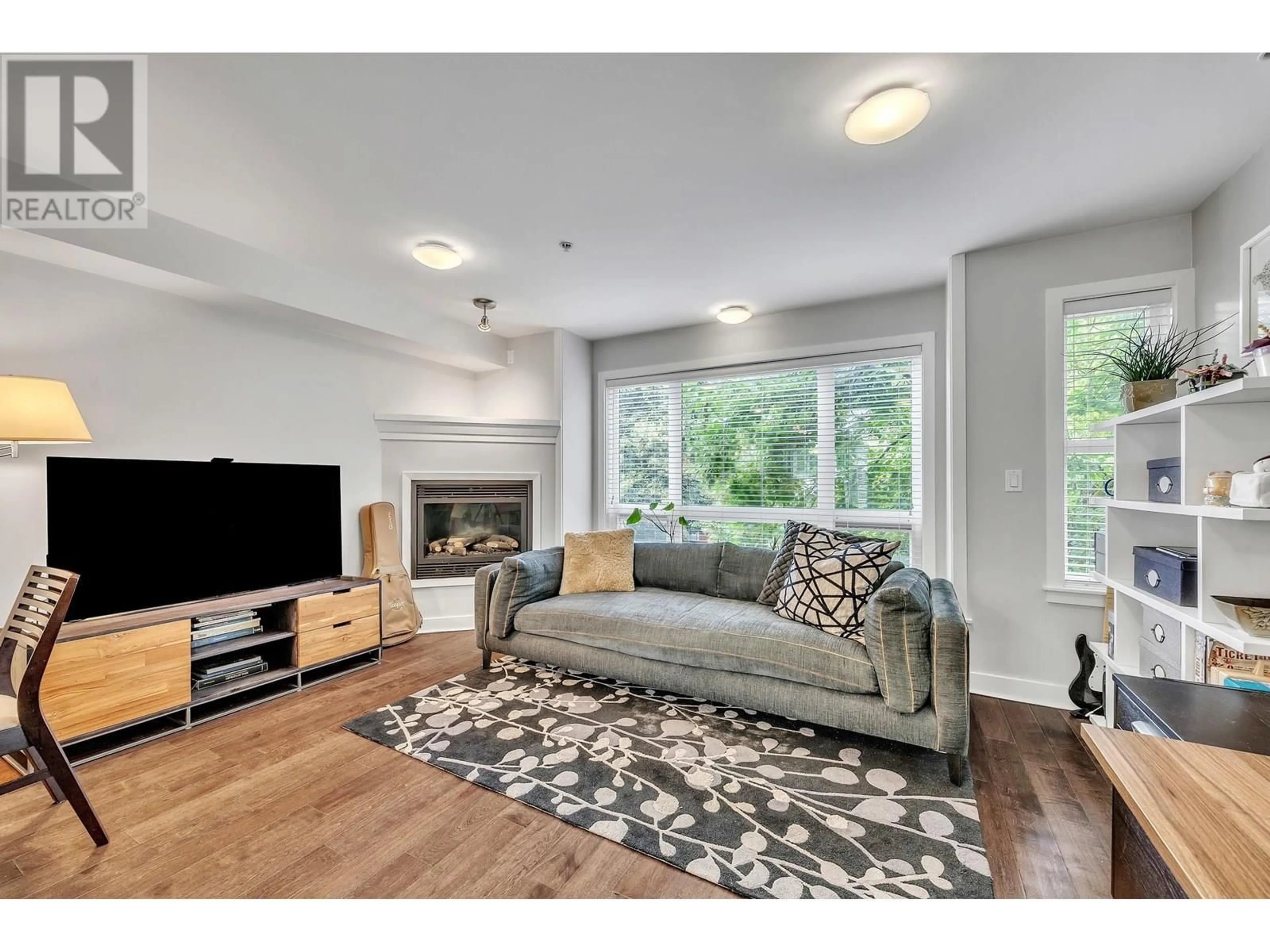 Living room with furniture, unknown for 201 - 3736 COMMERCIAL STREET, Vancouver British Columbia V5N4G2