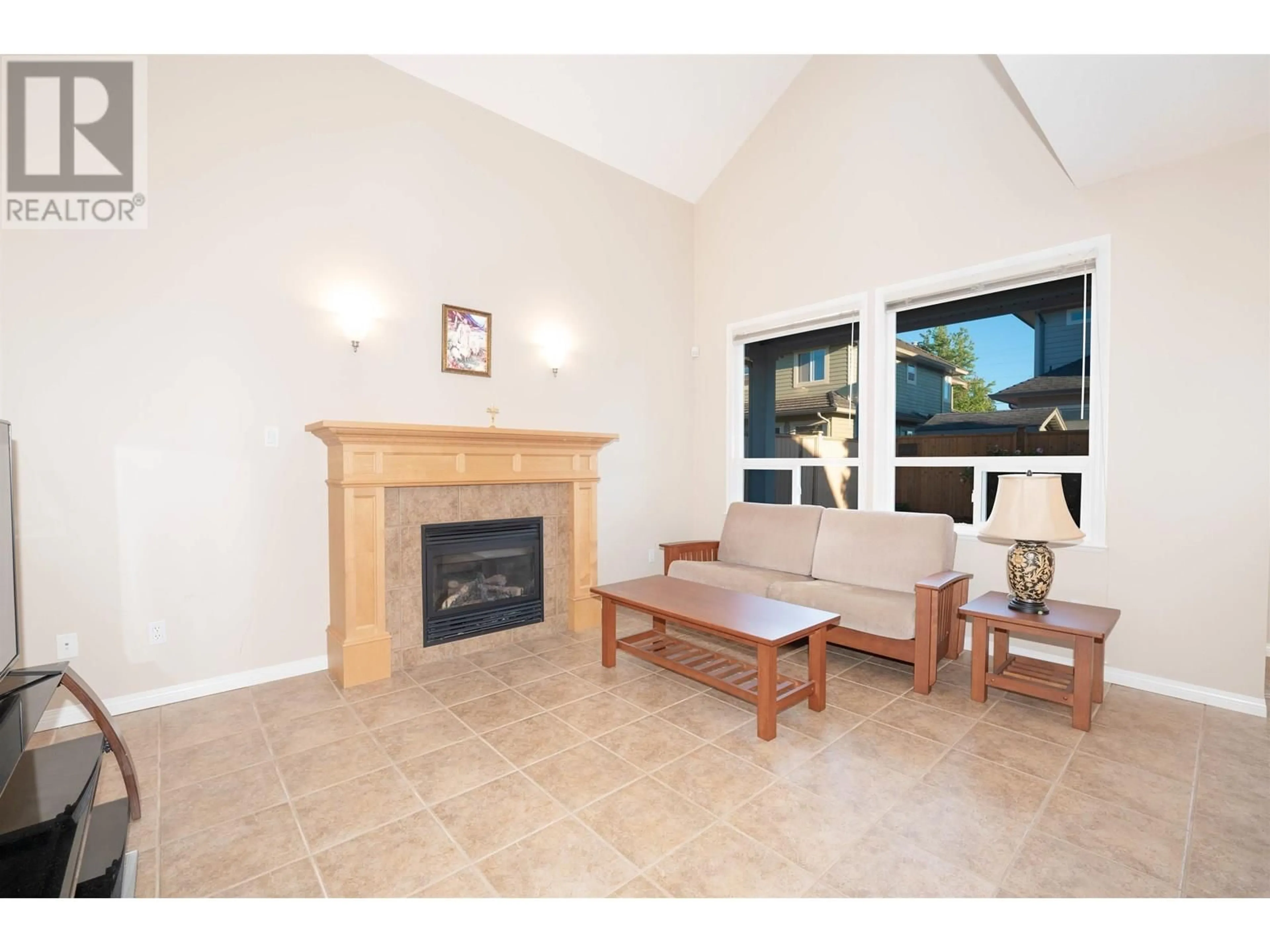 Living room with furniture, ceramic/tile floor for 9382 PAULESHIN CRESCENT, Richmond British Columbia V7E6P2