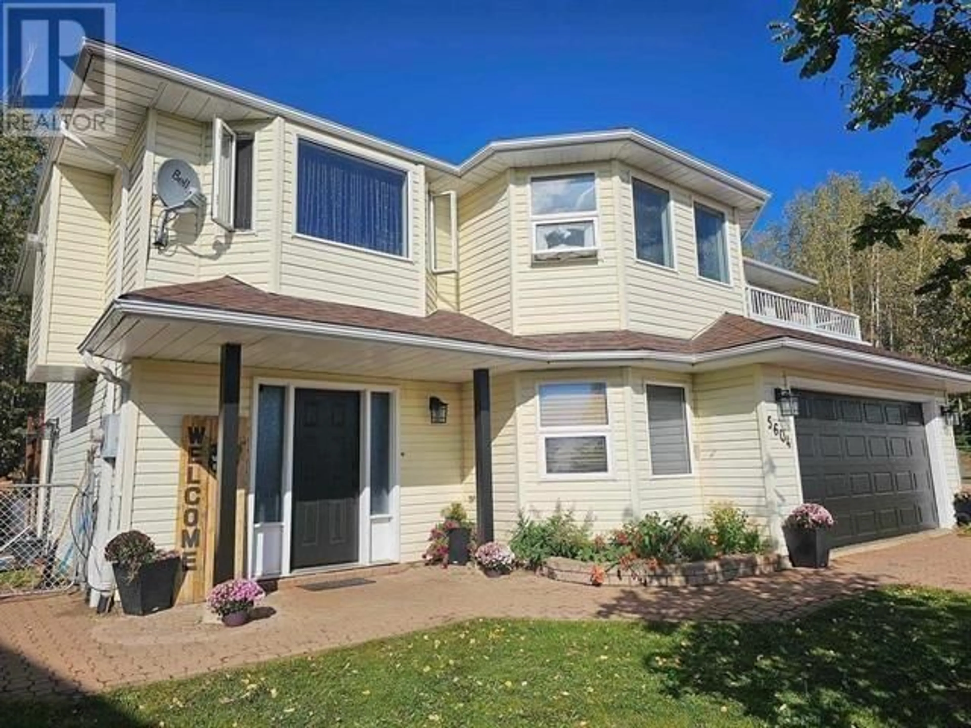 Home with vinyl exterior material, unknown for 5604 MINNAKER CRESCENT, Fort Nelson British Columbia V0C1R0