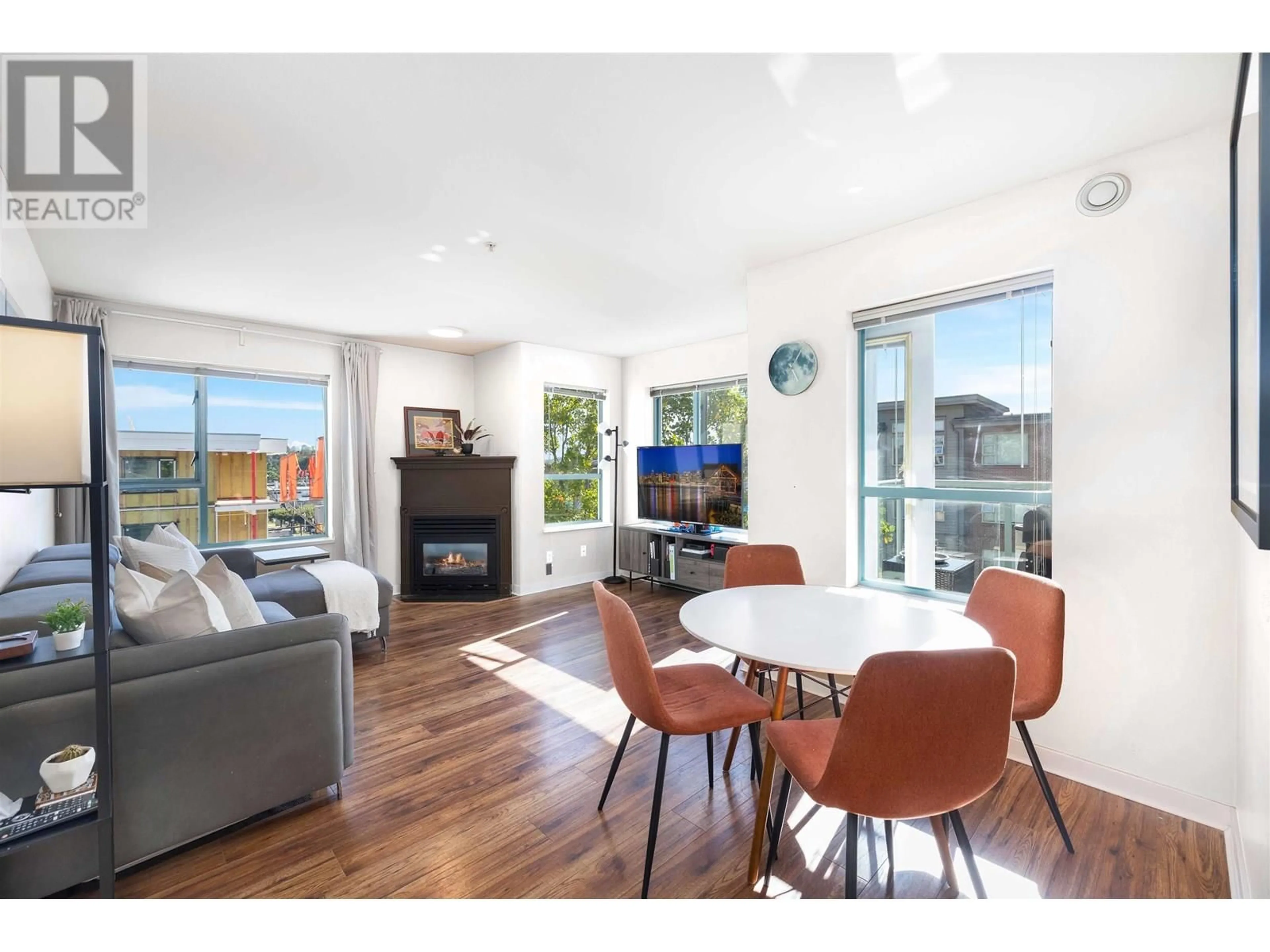 Living room with furniture, wood/laminate floor for 302 - 1085 17TH STREET, North Vancouver British Columbia V7P3R3