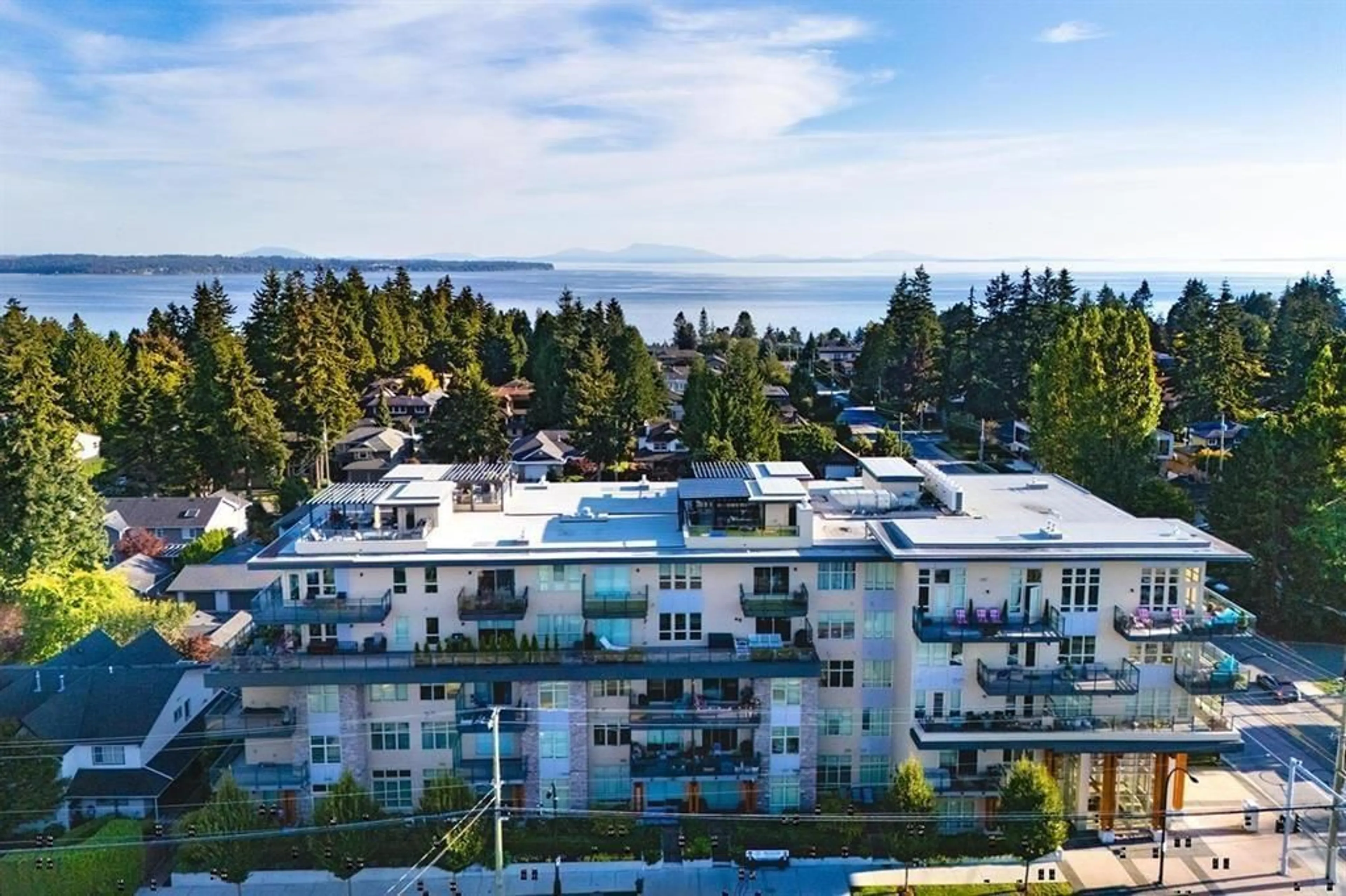 A pic from outside/outdoor area/front of a property/back of a property/a pic from drone, water/lake/river/ocean view for 203 - 14022 NORTH BLUFF, White Rock British Columbia V4B3C3