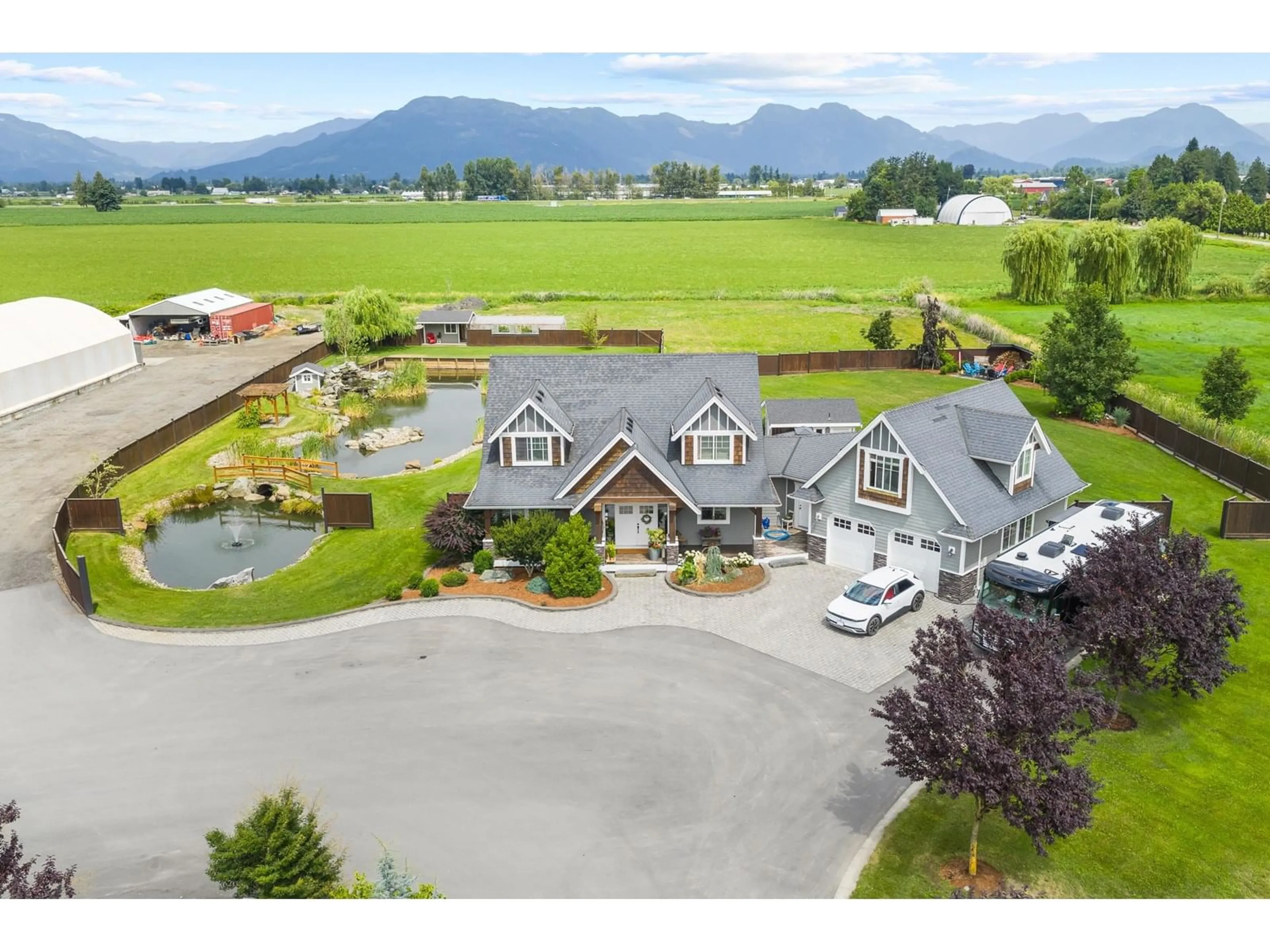 A pic from outside/outdoor area/front of a property/back of a property/a pic from drone, mountain view for 49517 PRAIRIE CENTRAL ROAD, Chilliwack British Columbia V2P6H3
