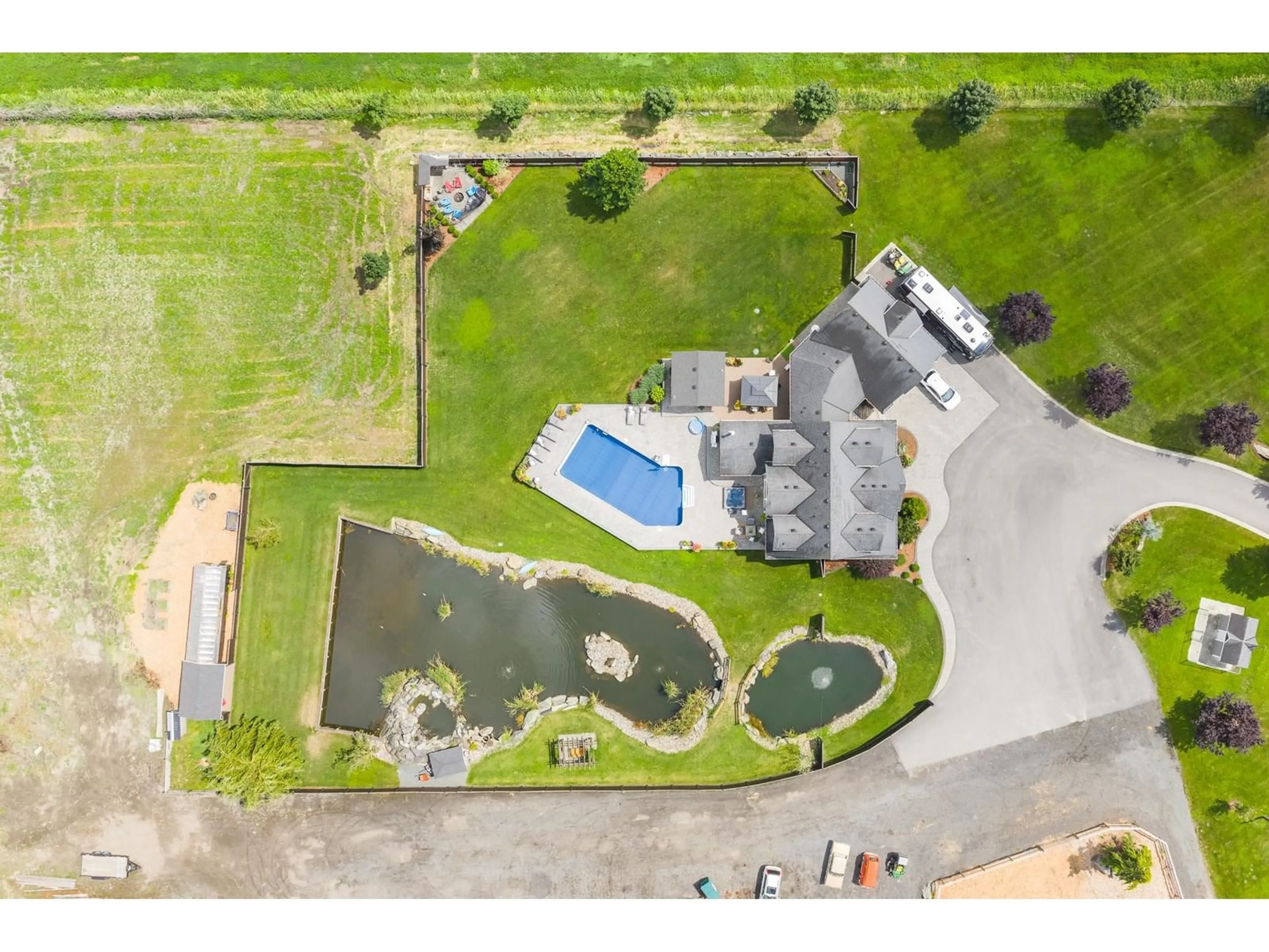 A pic from outside/outdoor area/front of a property/back of a property/a pic from drone, water/lake/river/ocean view for 49517 PRAIRIE CENTRAL ROAD, Chilliwack British Columbia V2P6H3