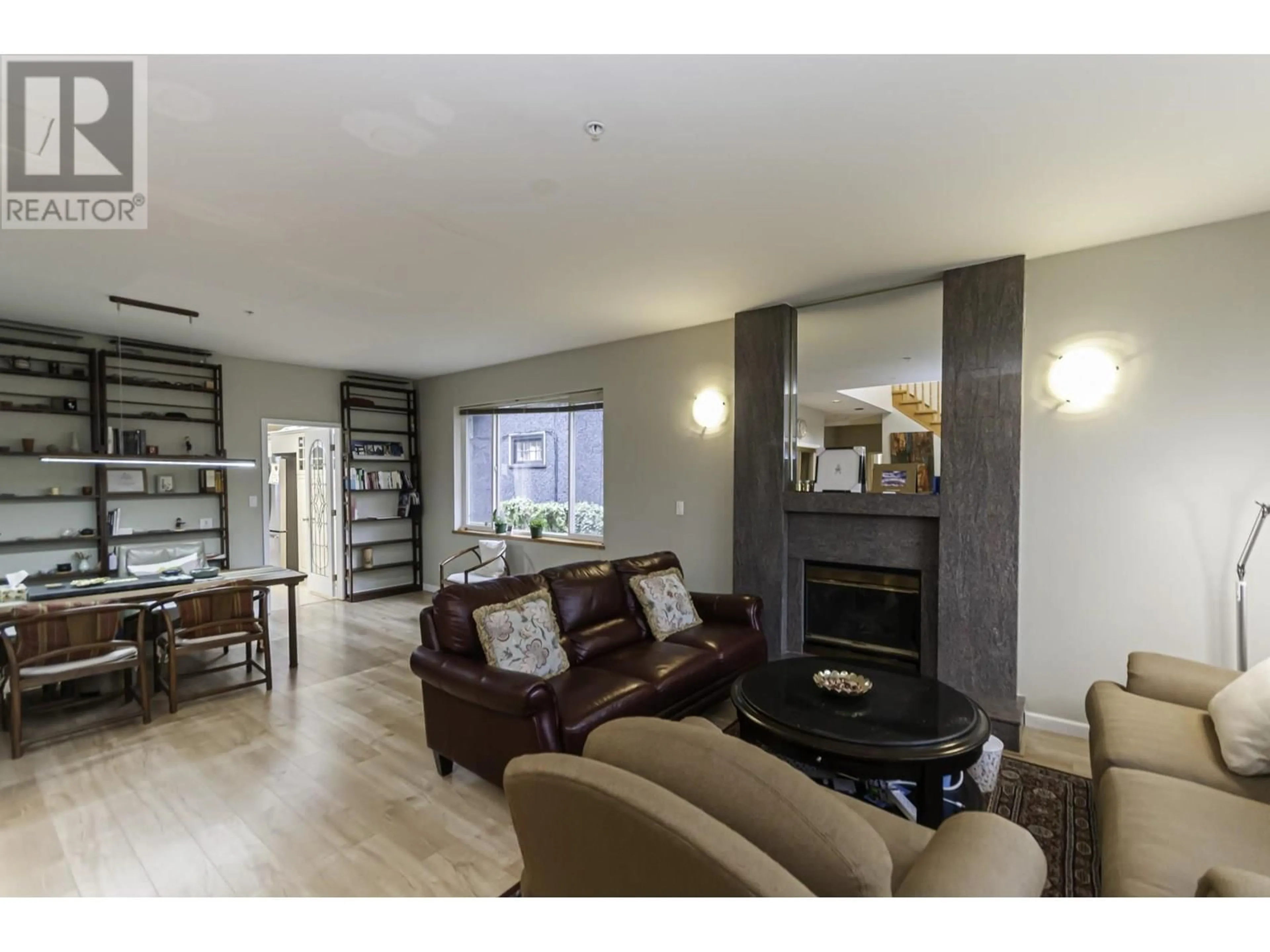 Living room with furniture, wood/laminate floor for 3456 36TH AVENUE, Vancouver British Columbia V6N2R9