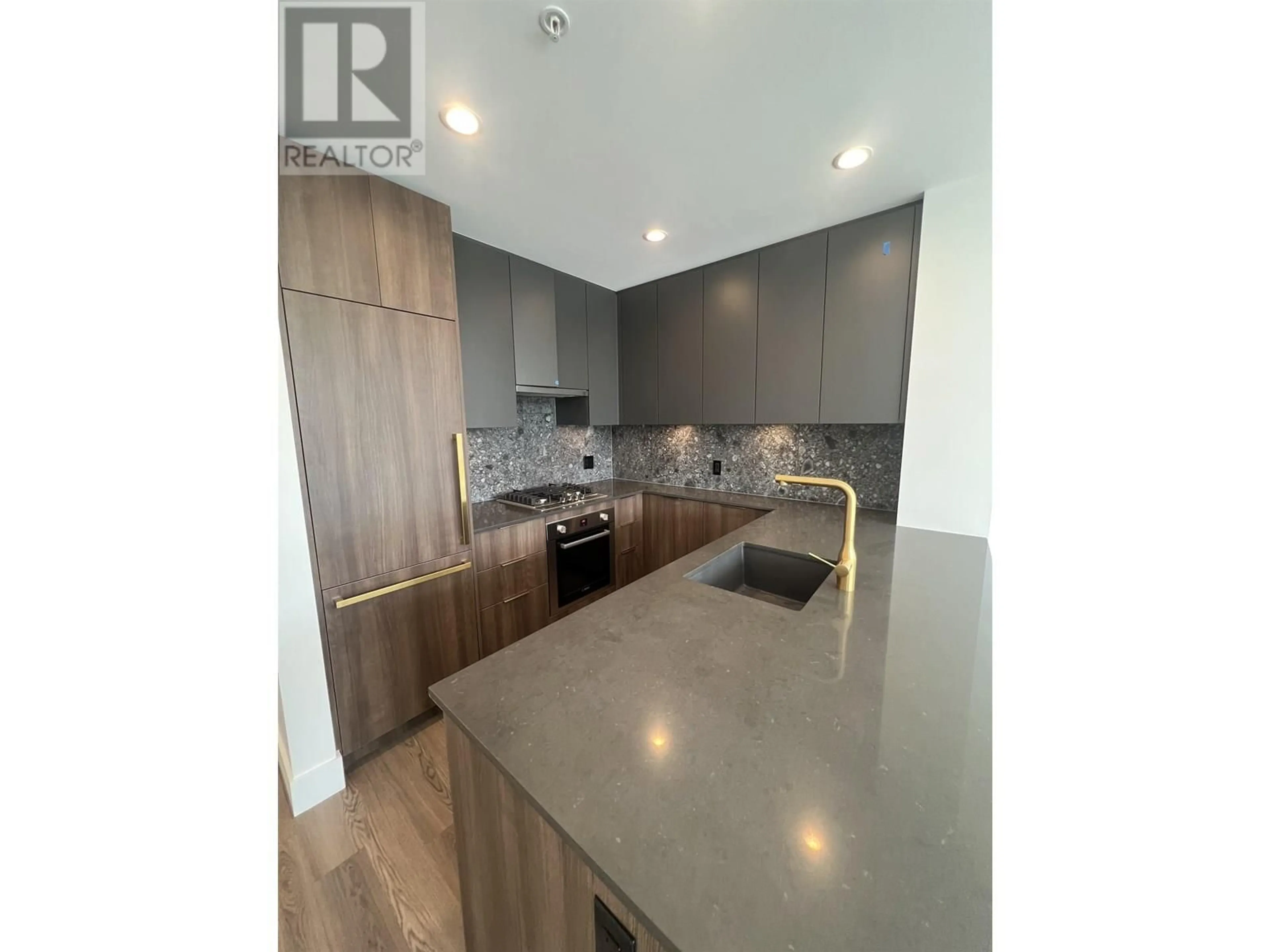 Open concept kitchen, unknown for 409 - 2385 EMERY COURT, North Vancouver British Columbia V7J0E8