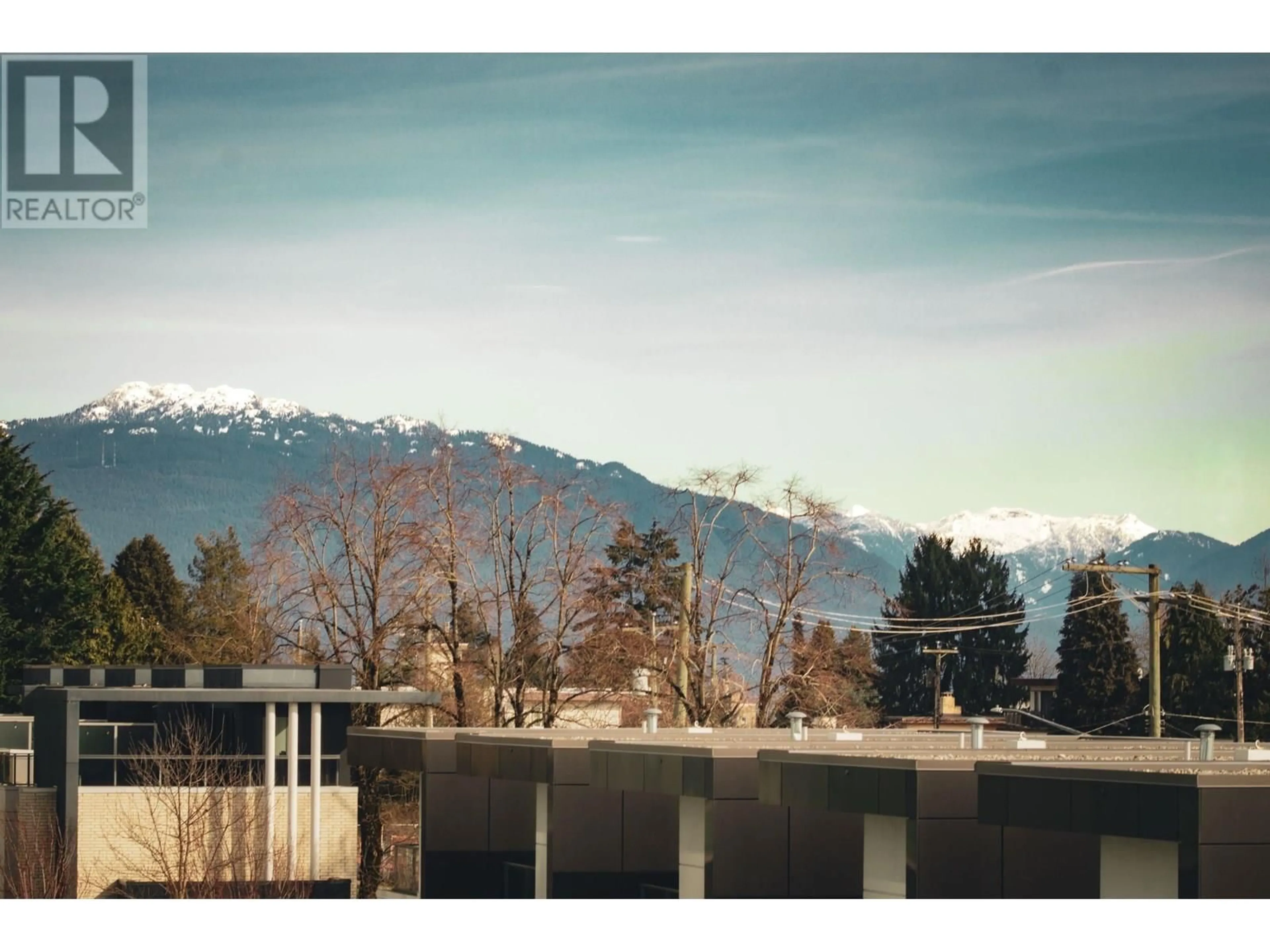 A pic from outside/outdoor area/front of a property/back of a property/a pic from drone, mountain view for 407 - 5051 IMPERIAL STREET, Burnaby British Columbia V5J0J3