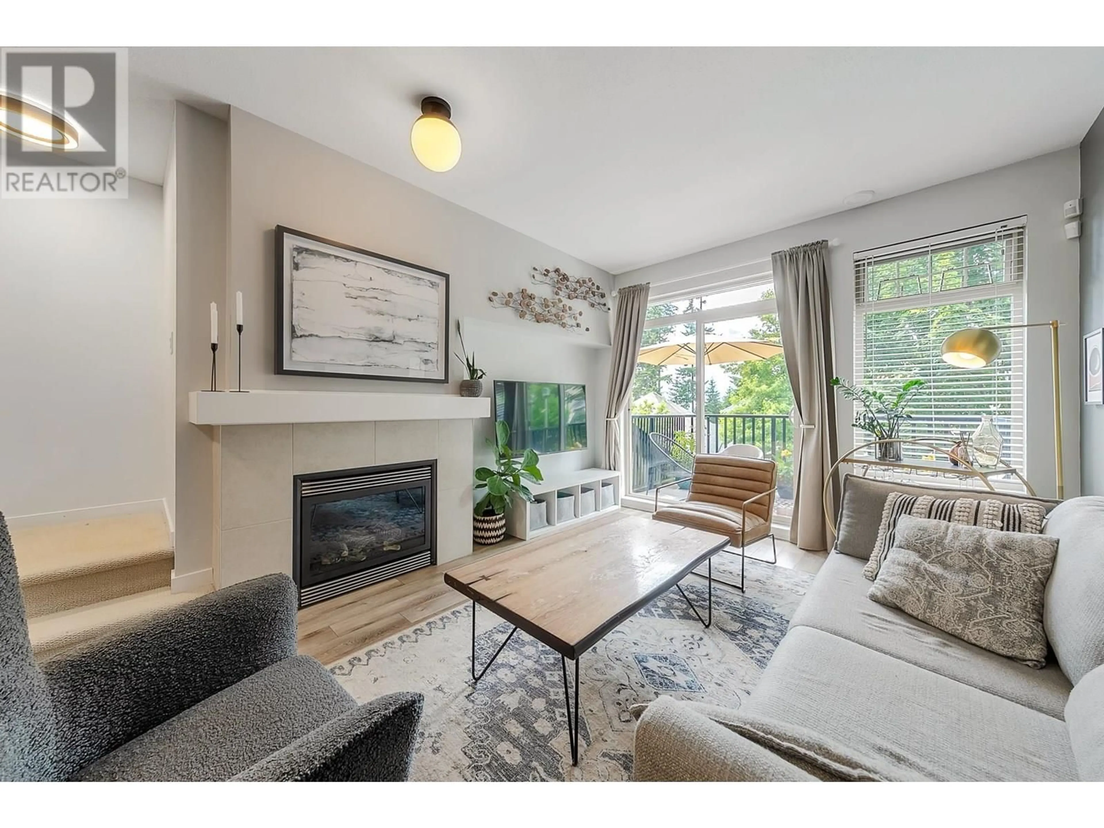 Living room with furniture, wood/laminate floor for 19 - 55 HAWTHORN DRIVE, Port Moody British Columbia V3H0B3