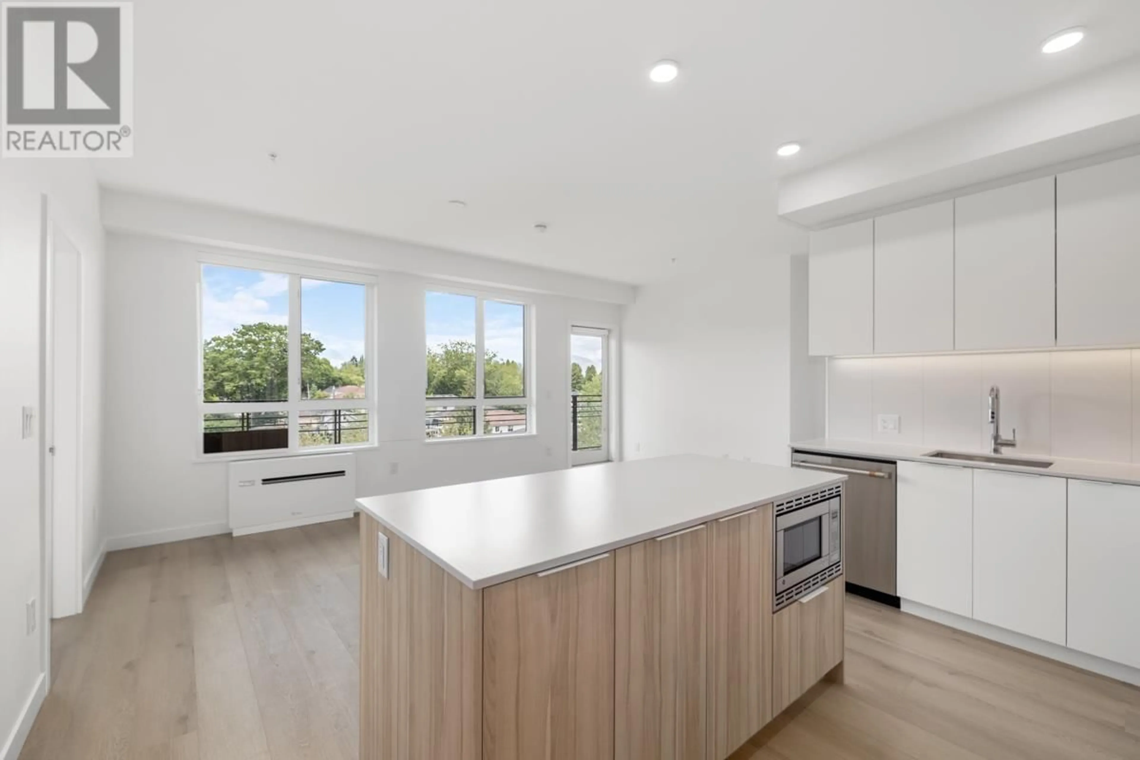 Open concept kitchen, unknown for 605 - 2450 GARDEN DRIVE, Vancouver British Columbia V5N0K1