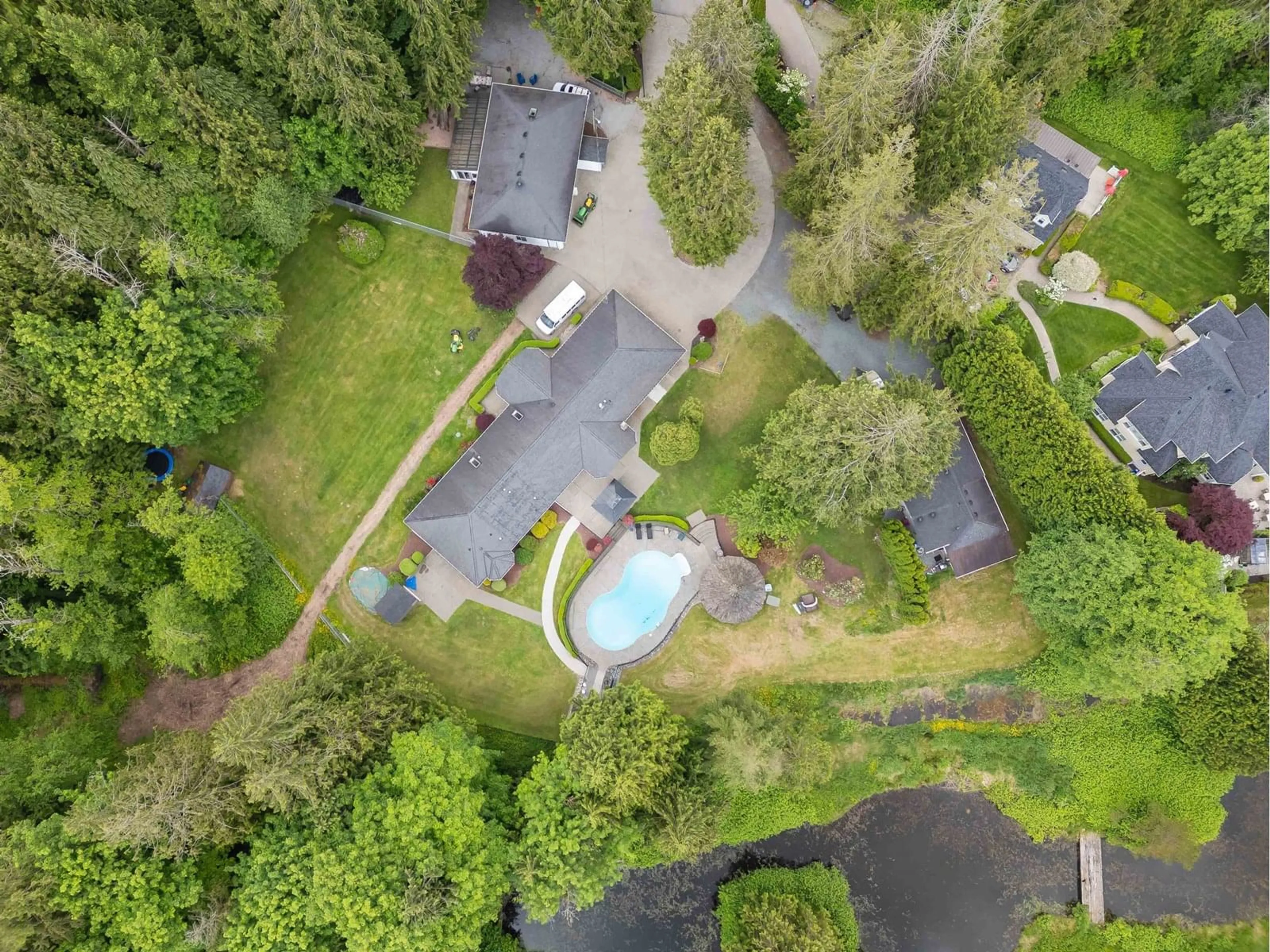 A pic from outside/outdoor area/front of a property/back of a property/a pic from drone, forest/trees view for 6587 238, Langley British Columbia V2Y2H5