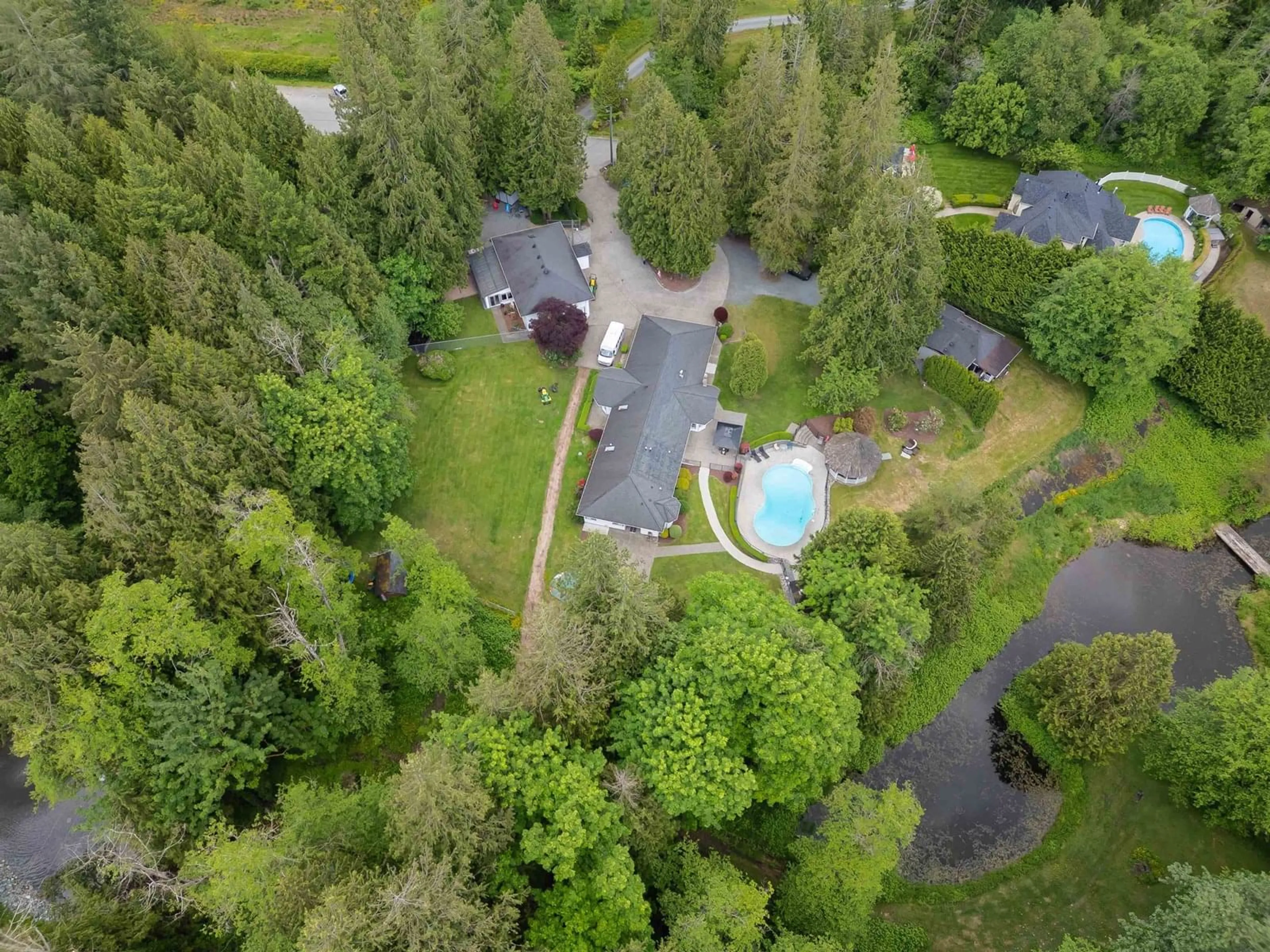 A pic from outside/outdoor area/front of a property/back of a property/a pic from drone, forest/trees view for 6587 238, Langley British Columbia V2Y2H5
