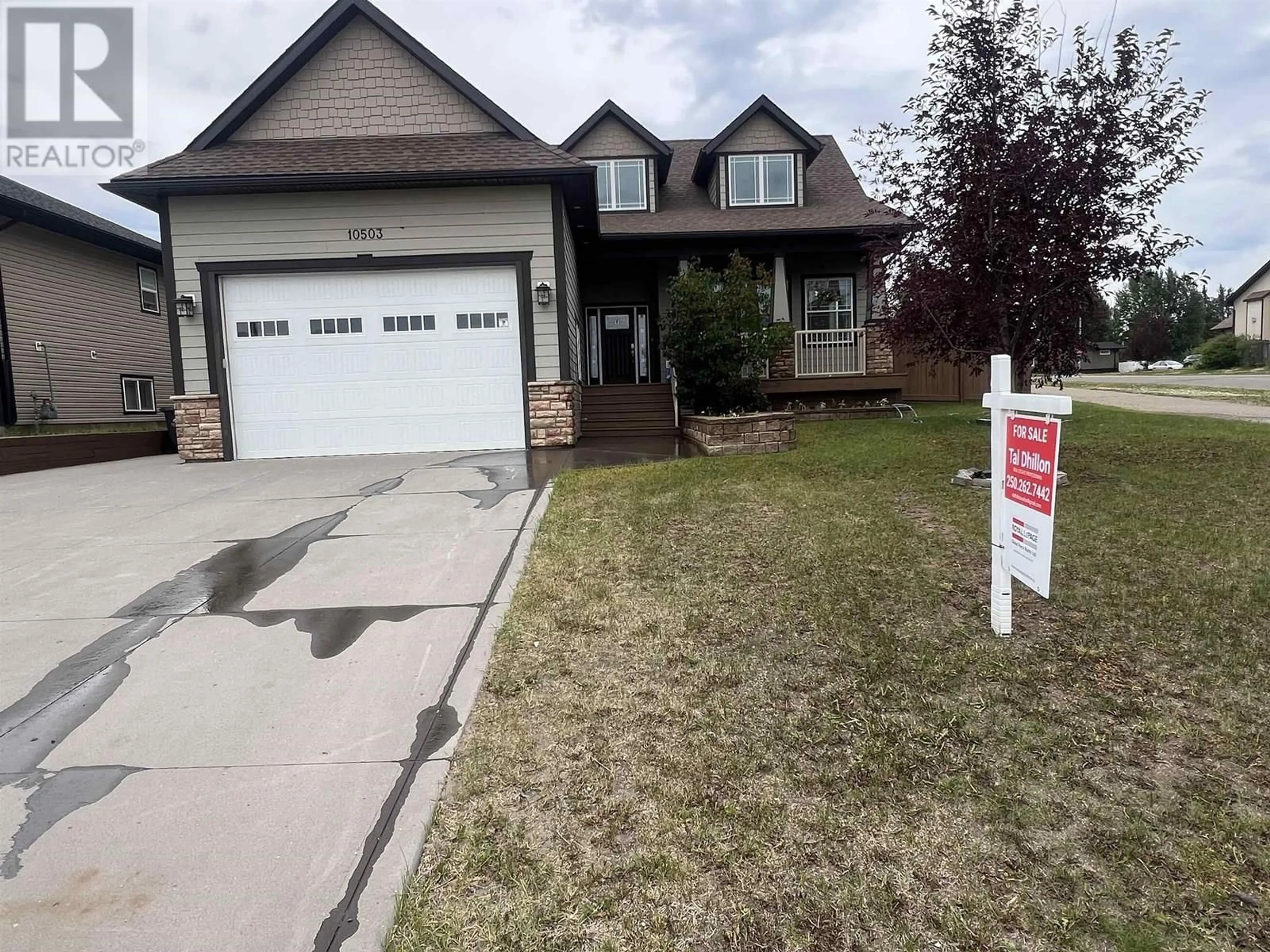 Home with vinyl exterior material, street for 10503 109 STREET, Fort St. John British Columbia V1J0J3