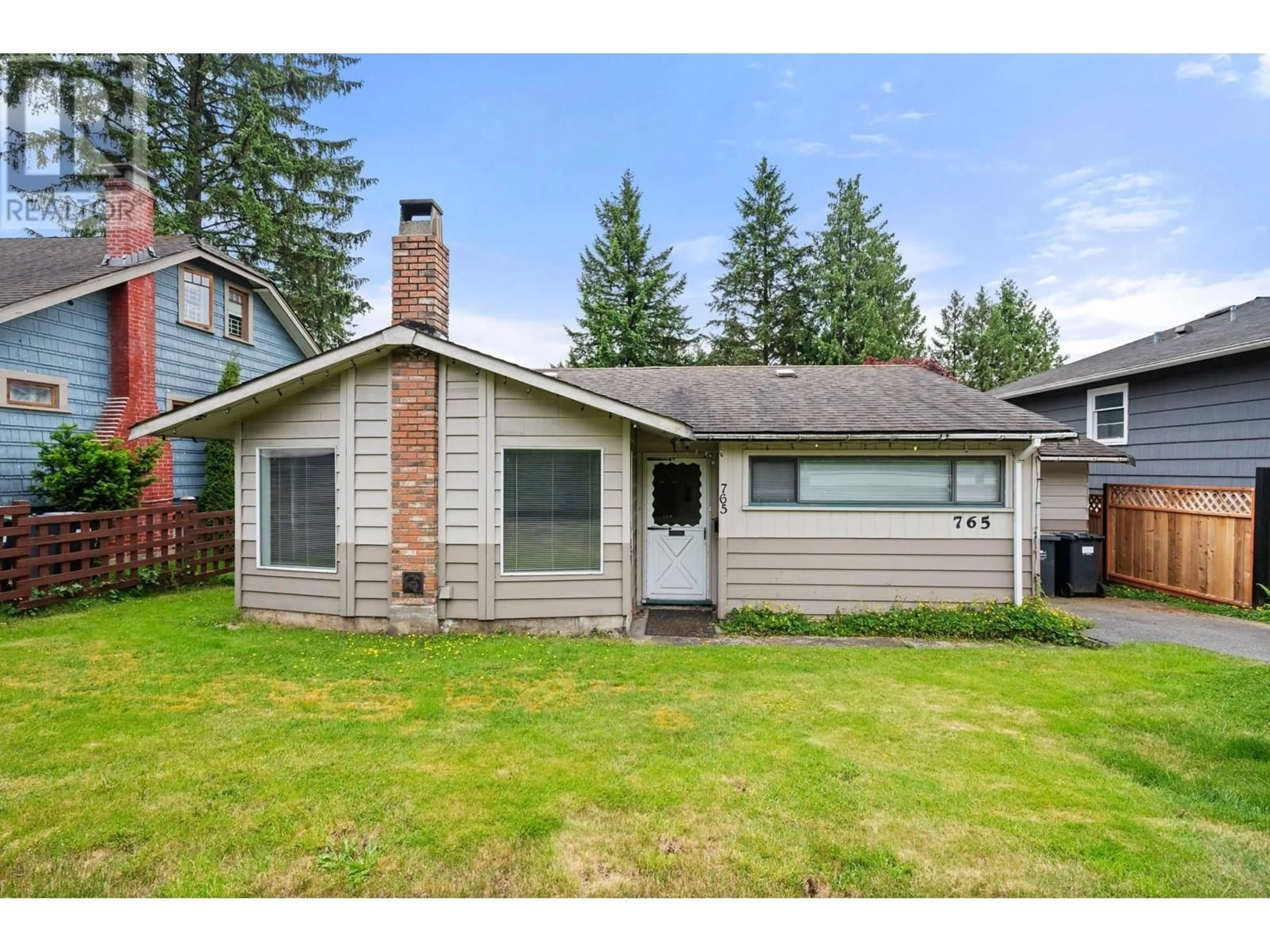 Home with vinyl exterior material, street for 765 LYNN VALLEY ROAD, North Vancouver British Columbia V7J1Z5