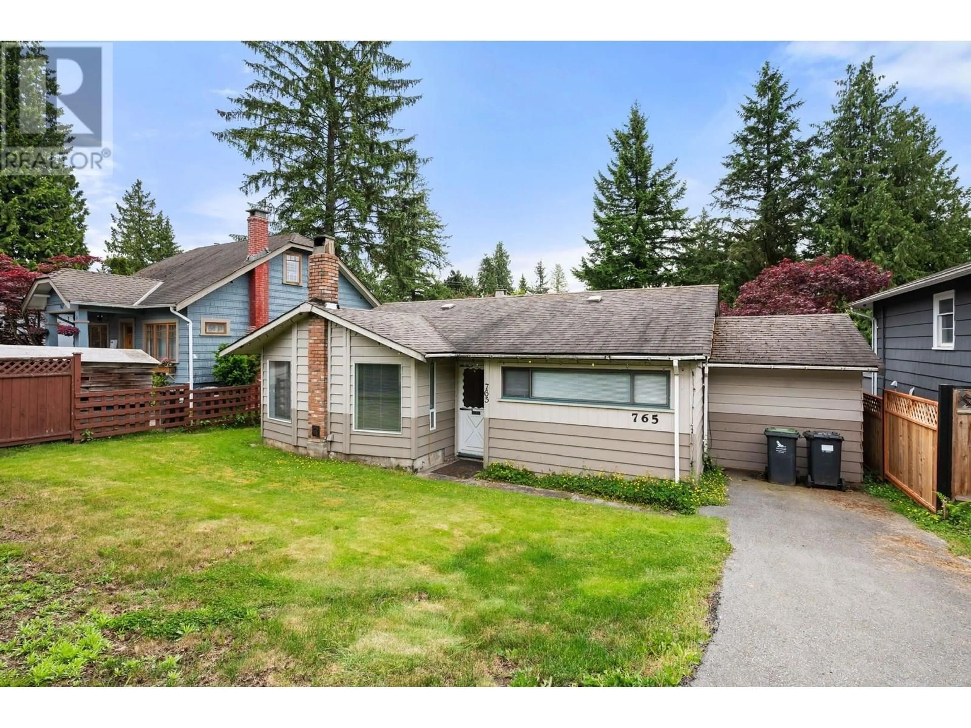 Home with vinyl exterior material, street for 765 LYNN VALLEY ROAD, North Vancouver British Columbia V7J1Z5