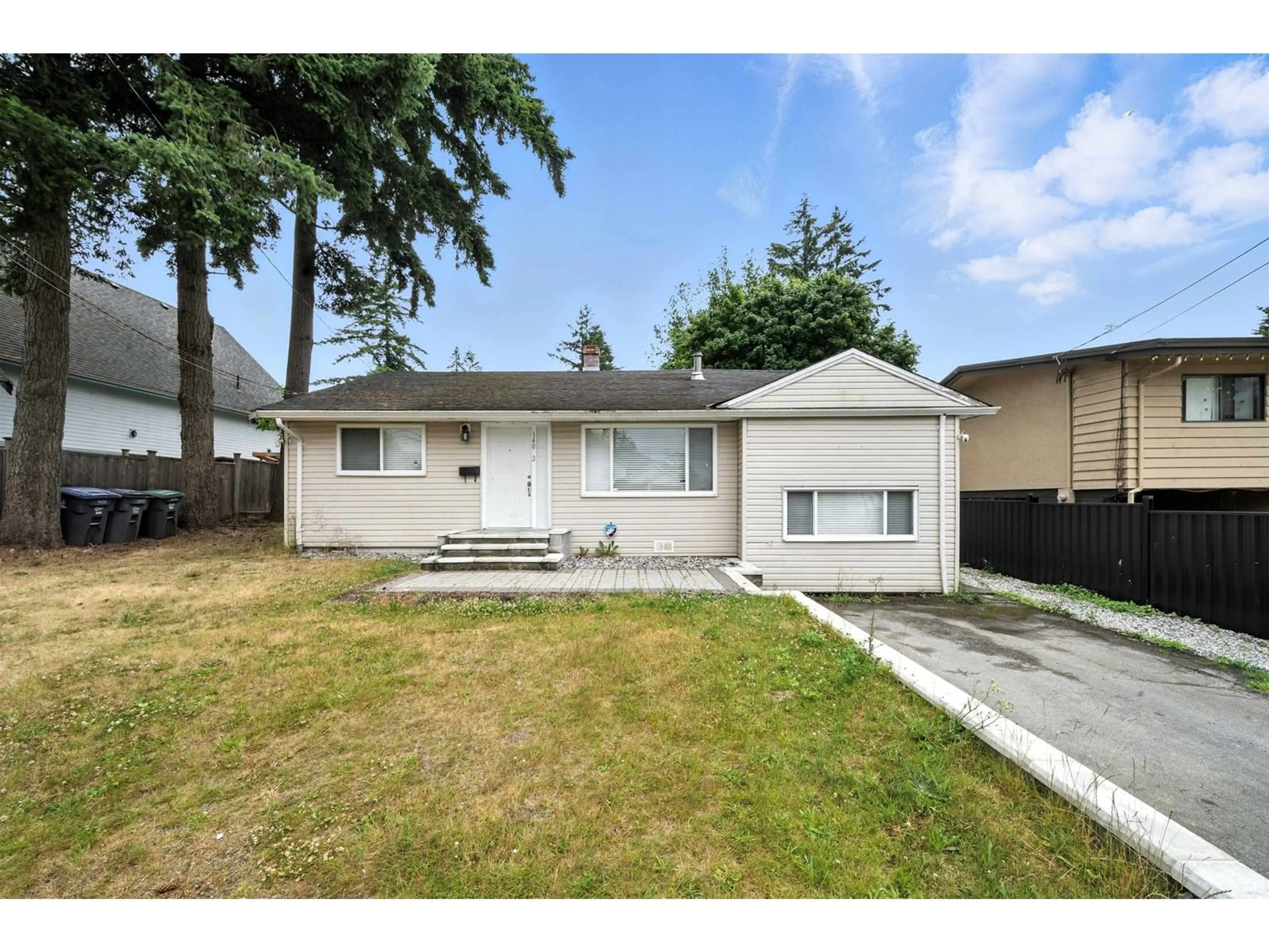 Home with vinyl exterior material, street for 14032 GROSVENOR, Surrey British Columbia V3R5G5