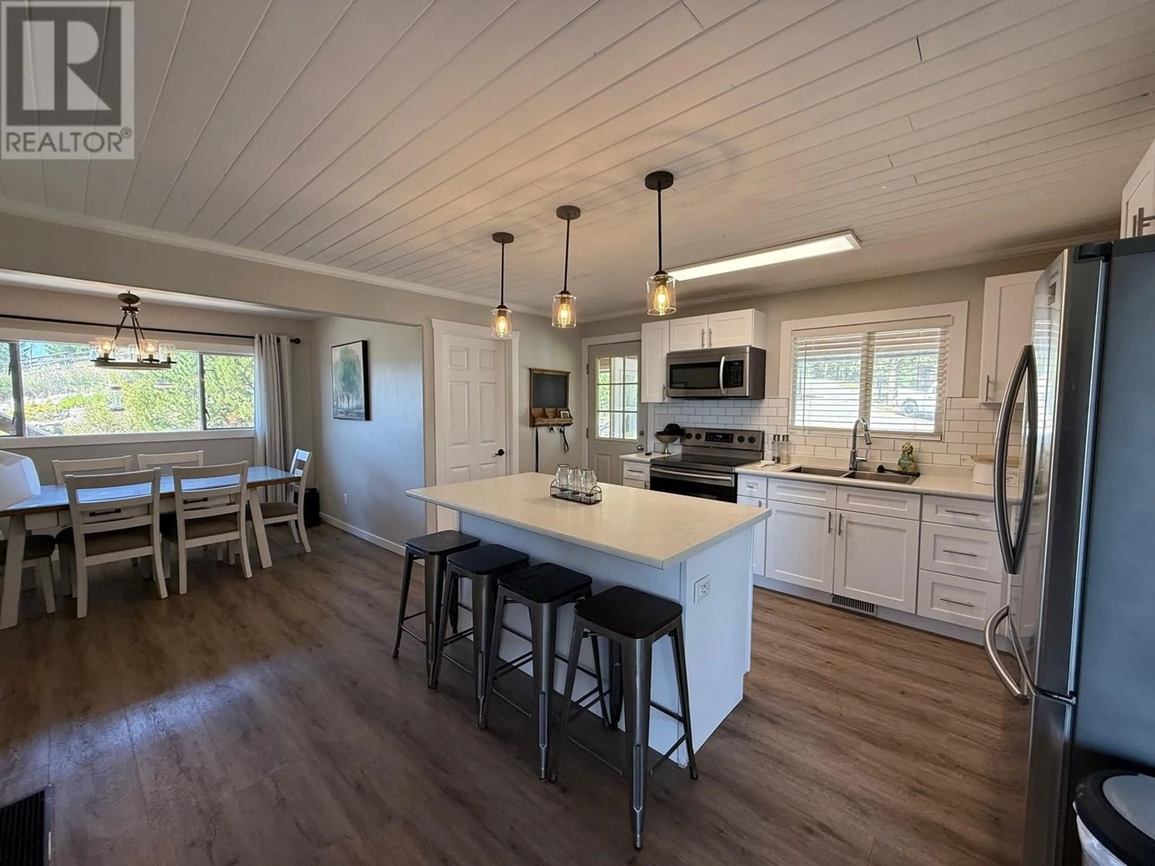 Open concept kitchen, wood/laminate floor for 1121 SODA CREEK ROAD, Williams Lake British Columbia V2G5E4