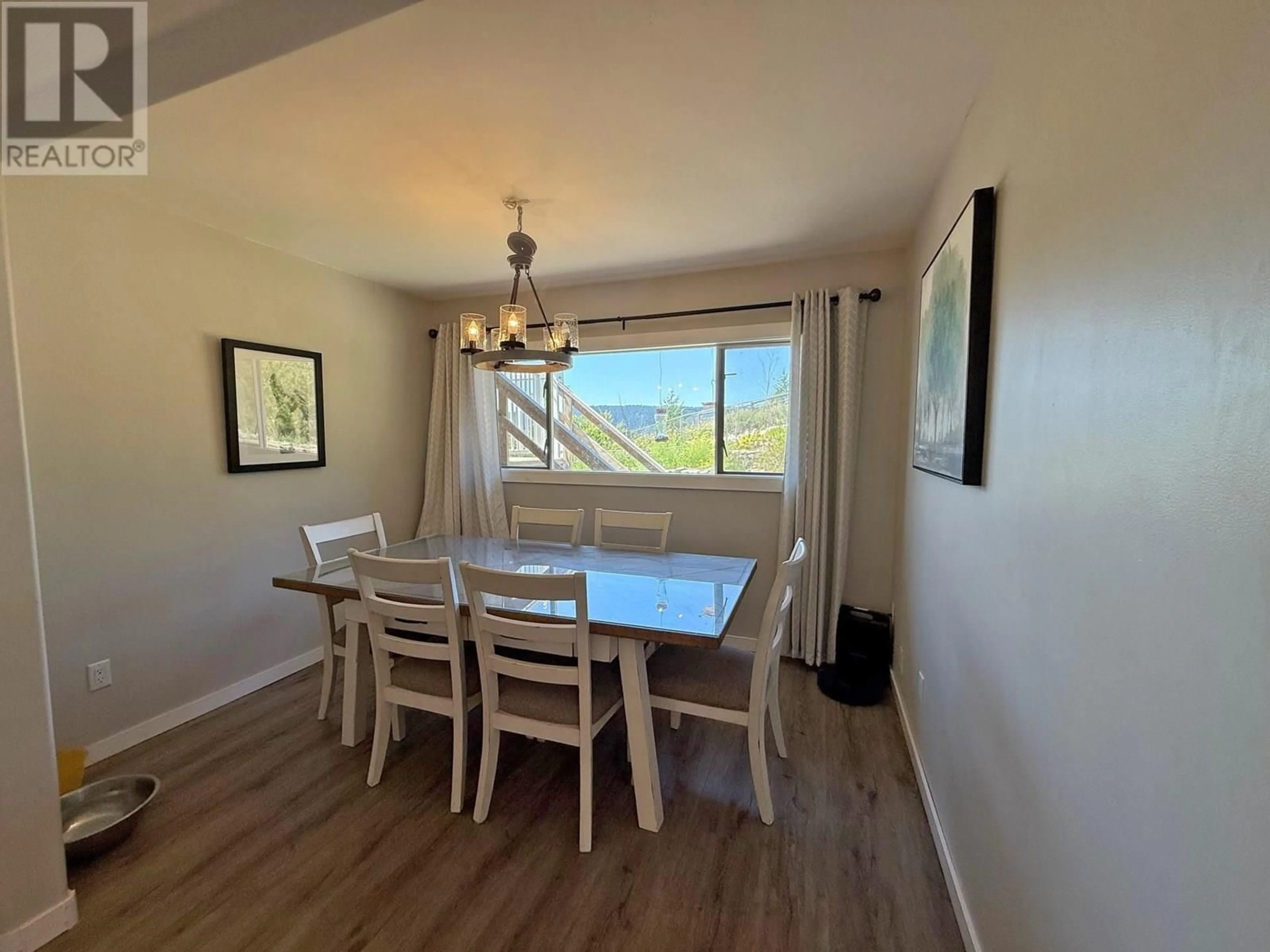 Dining room, wood/laminate floor for 1121 SODA CREEK ROAD, Williams Lake British Columbia V2G5E4