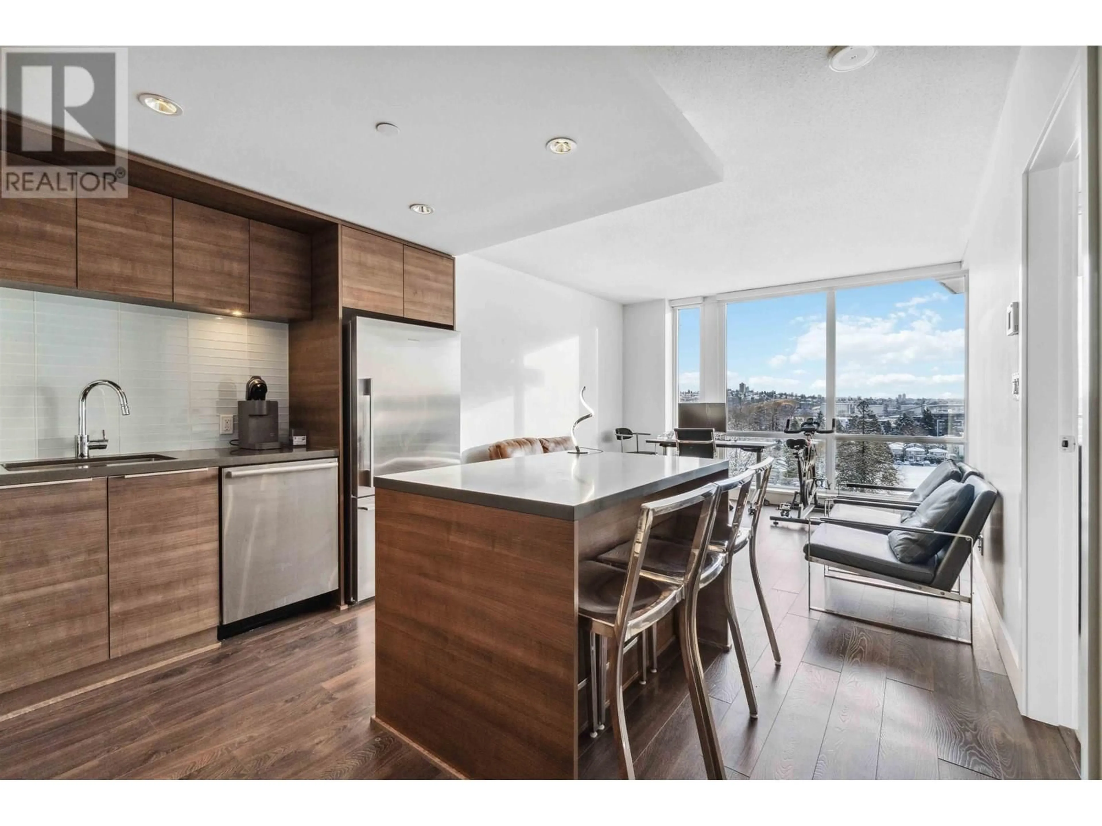 Open concept kitchen, wood/laminate floor for 1005 - 1550 FERN STREET, North Vancouver British Columbia V7J0A9