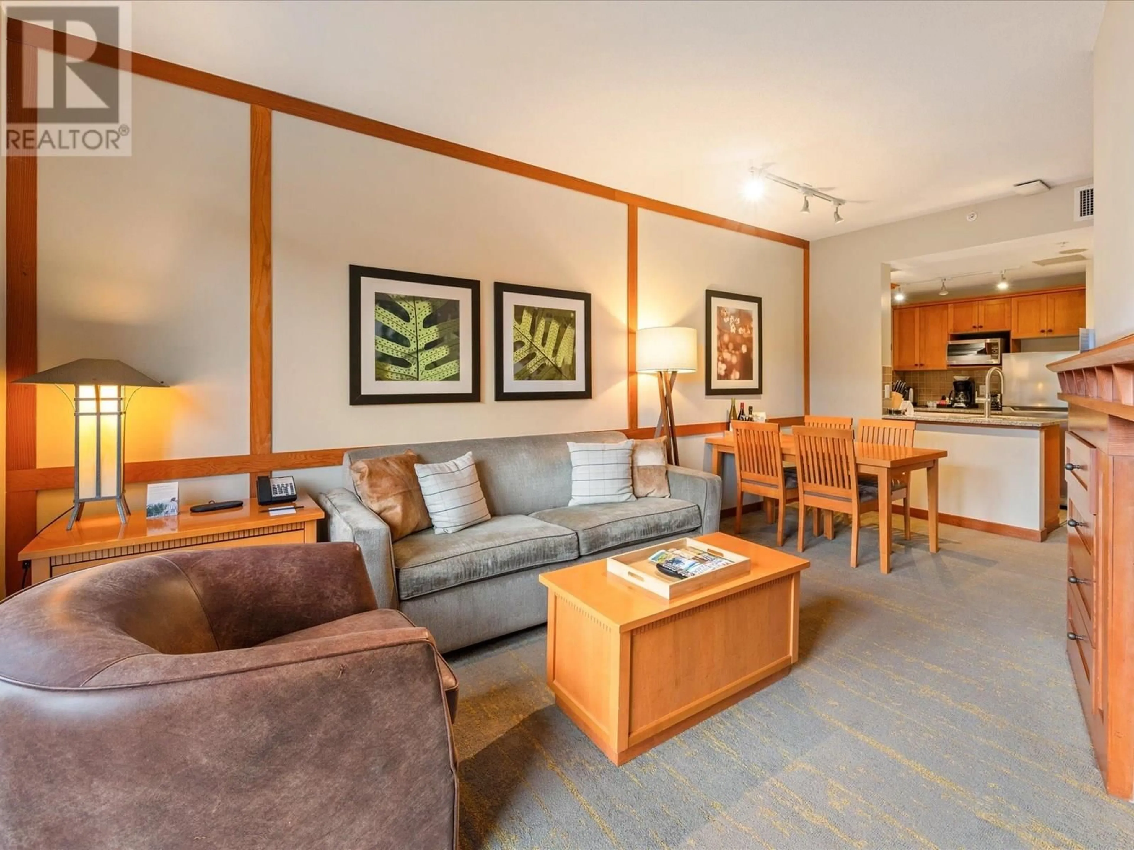 Living room with furniture, wood/laminate floor for 514 - 4320 SUNDIAL CRESCENT, Whistler British Columbia V8E1G6