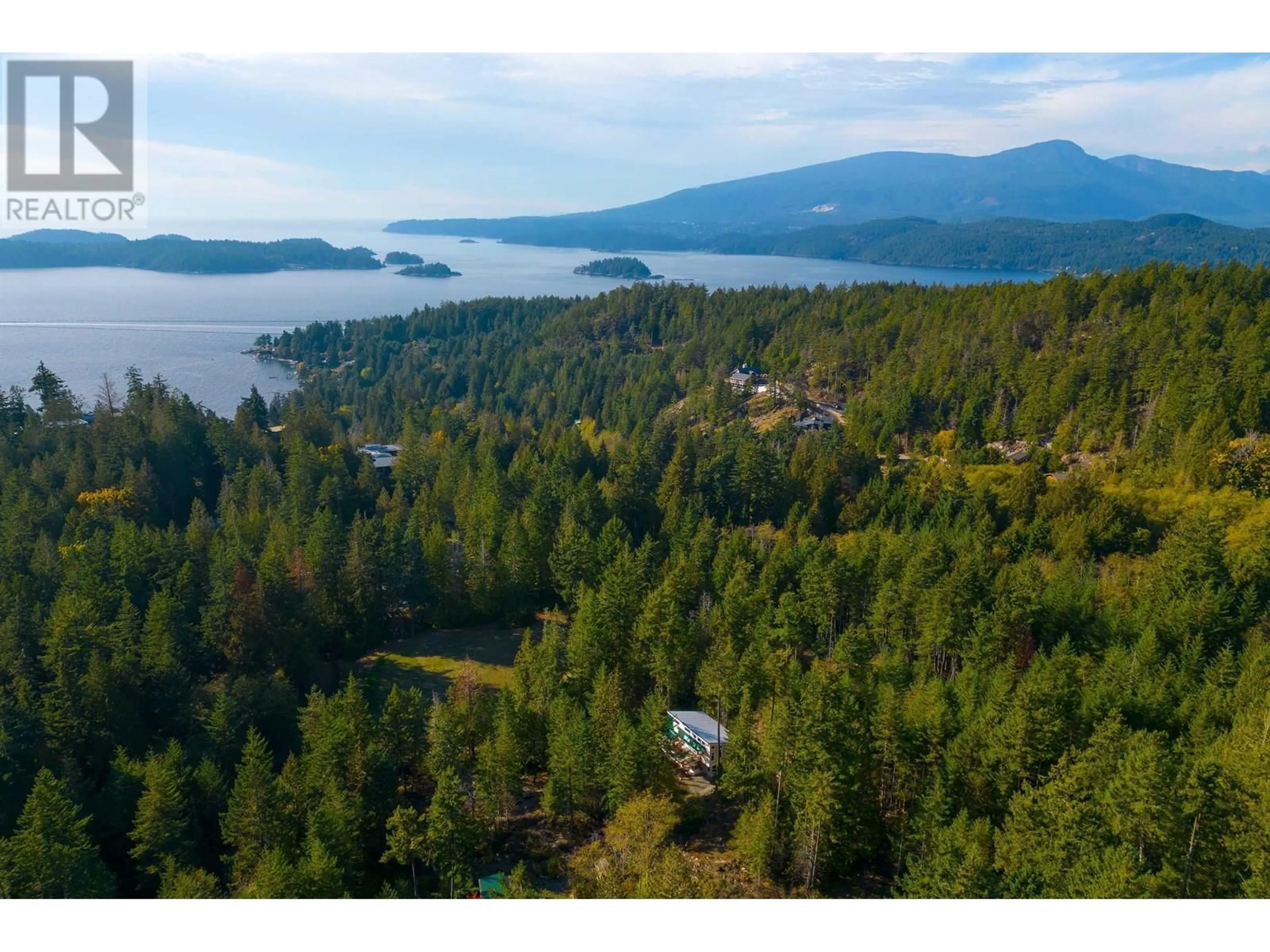 A pic from outside/outdoor area/front of a property/back of a property/a pic from drone, water/lake/river/ocean view for 1580 EVERGREEN LANE, Bowen Island British Columbia V0N1G2