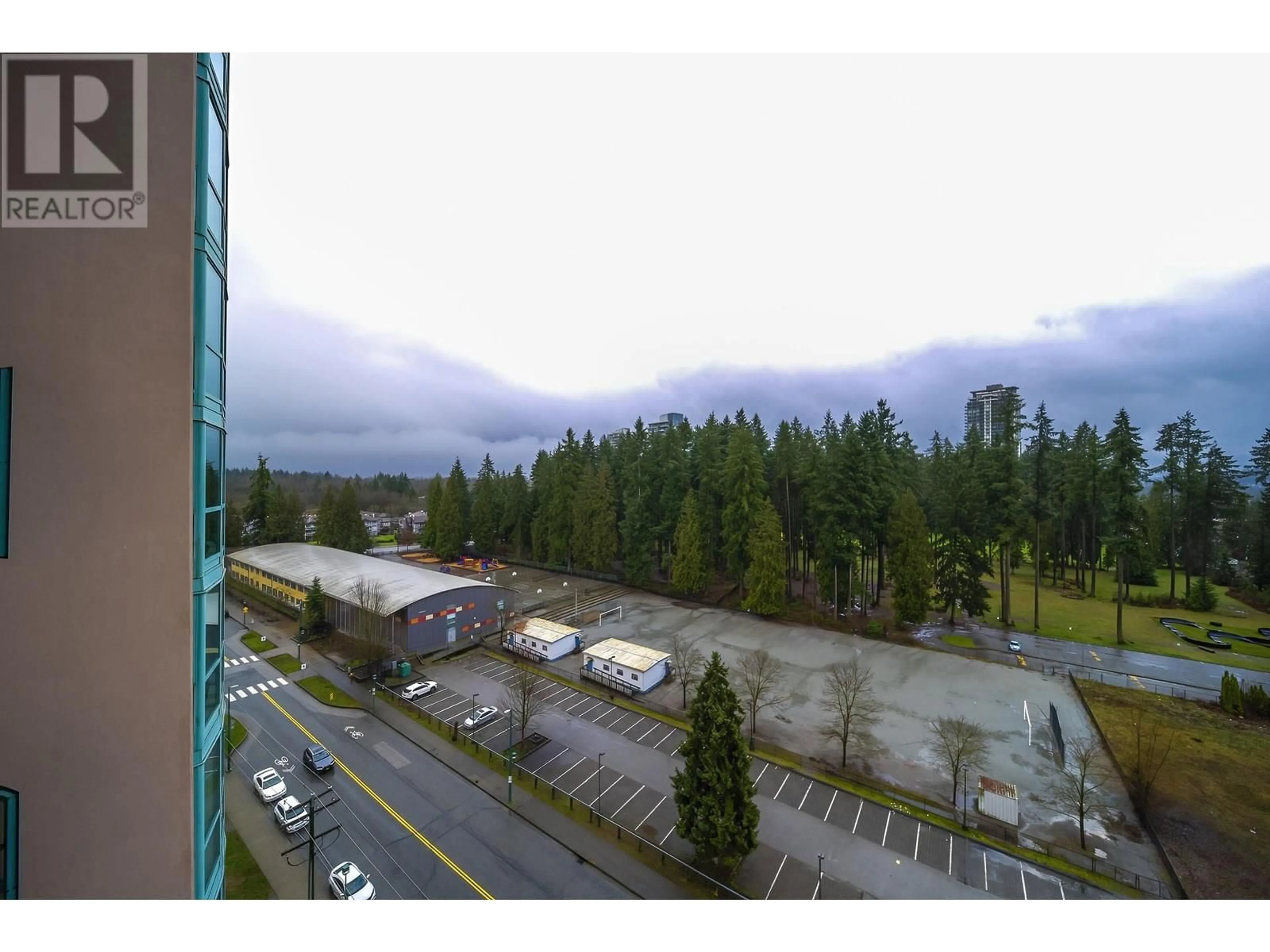 A pic from outside/outdoor area/front of a property/back of a property/a pic from drone, mountain view for 1203 - 3071 GLEN DRIVE, Coquitlam British Columbia V3B7R1